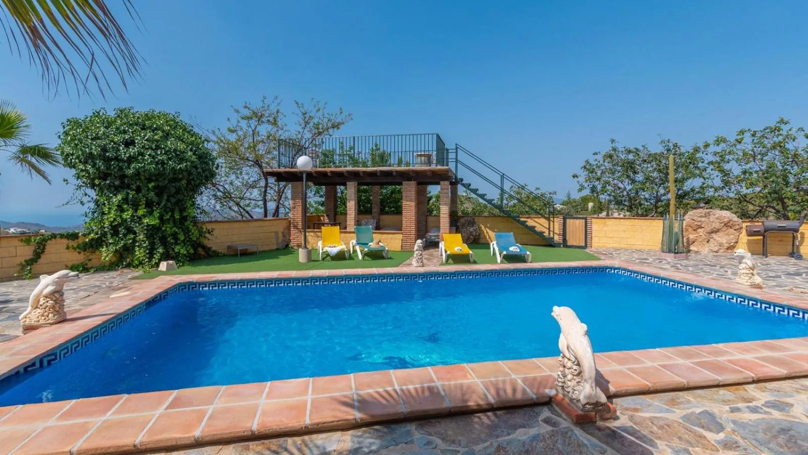 Swimming pool in Villa Paraiso Andaluz Sedella by Ruralidays