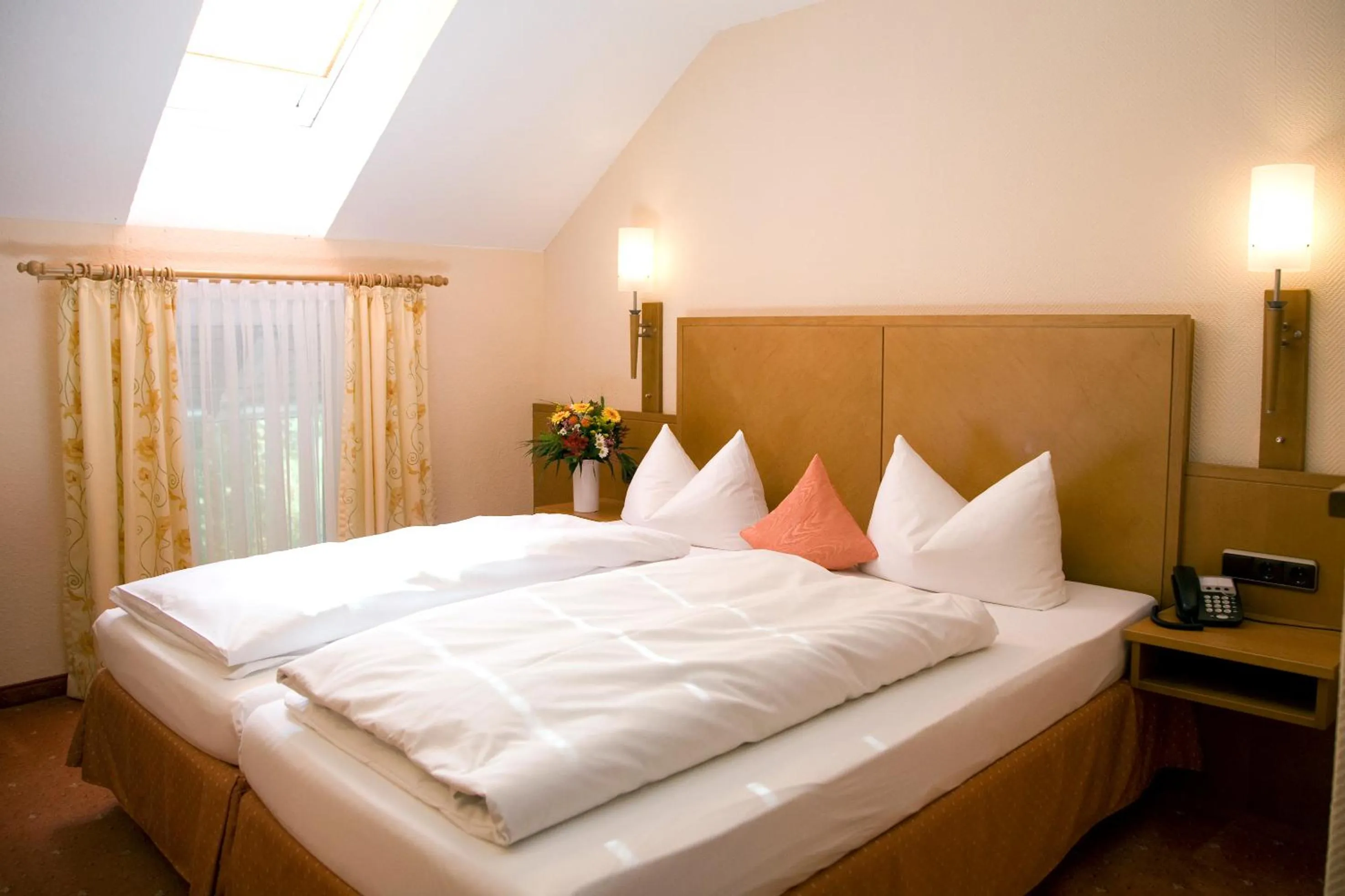 Bed in Seehotel Grauer Bär