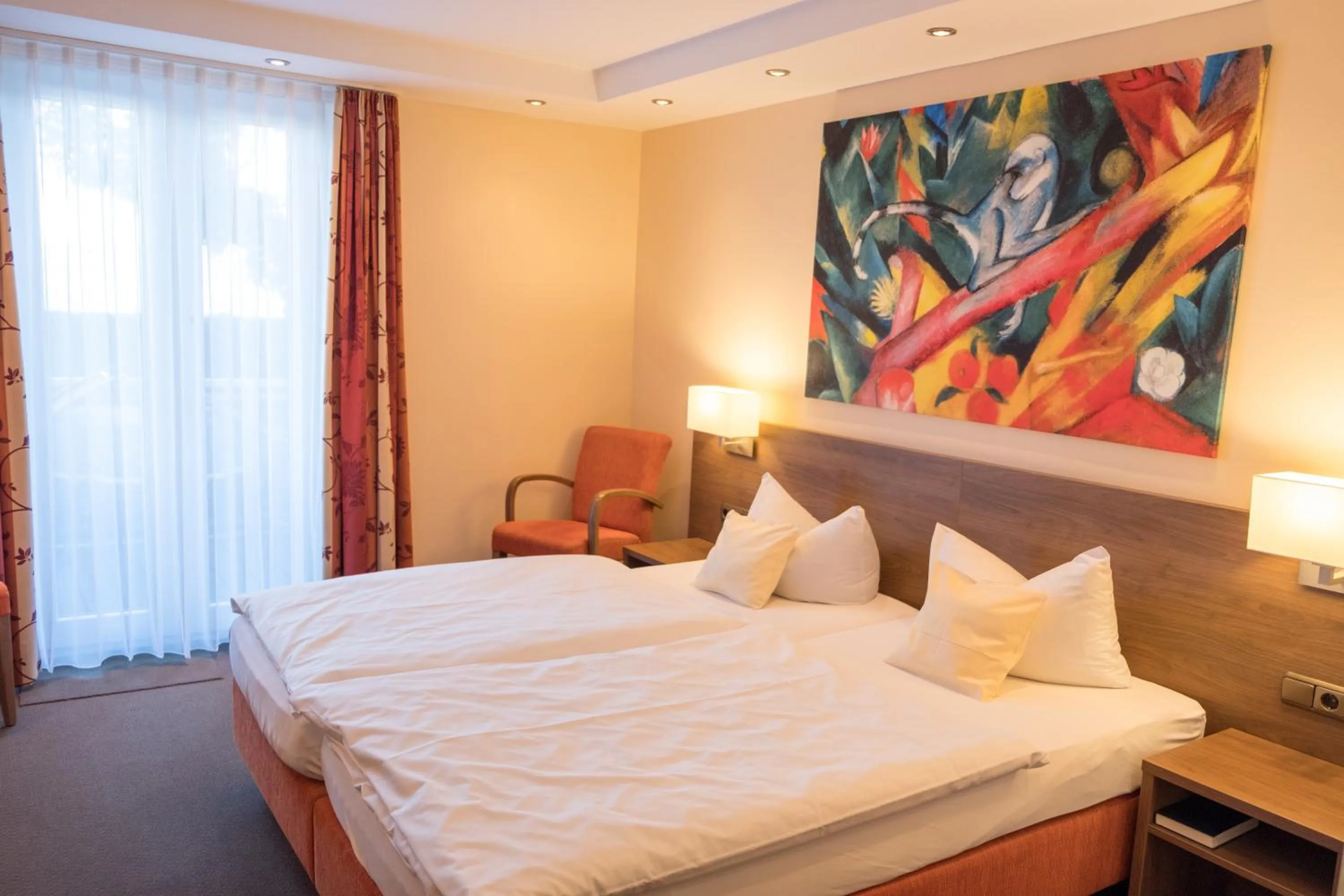 Bed in Seehotel Grauer Bär