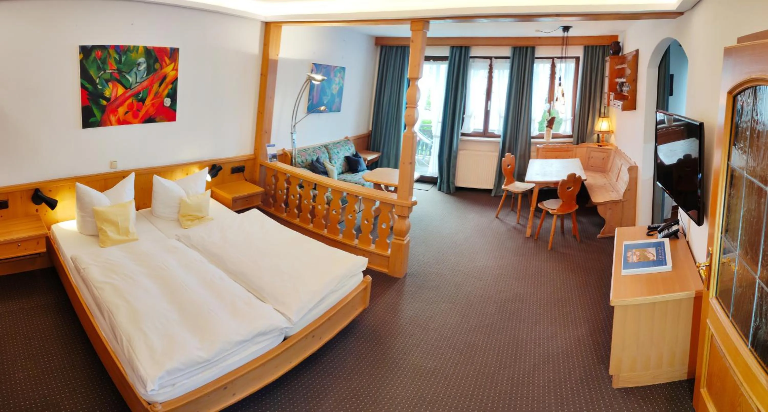 Photo of the whole room, Bed in Seehotel Grauer Bär