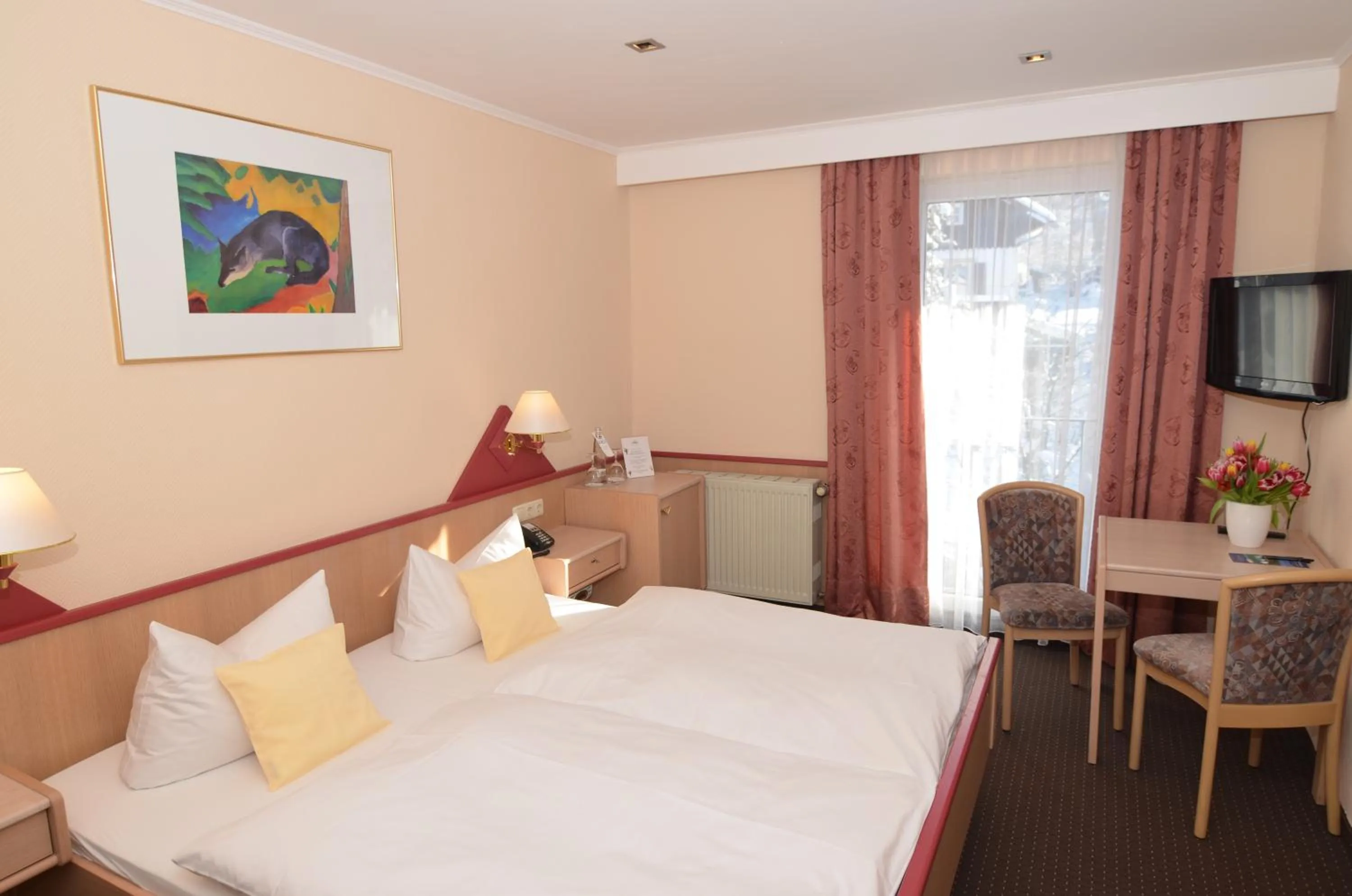 Photo of the whole room, Bed in Seehotel Grauer Bär