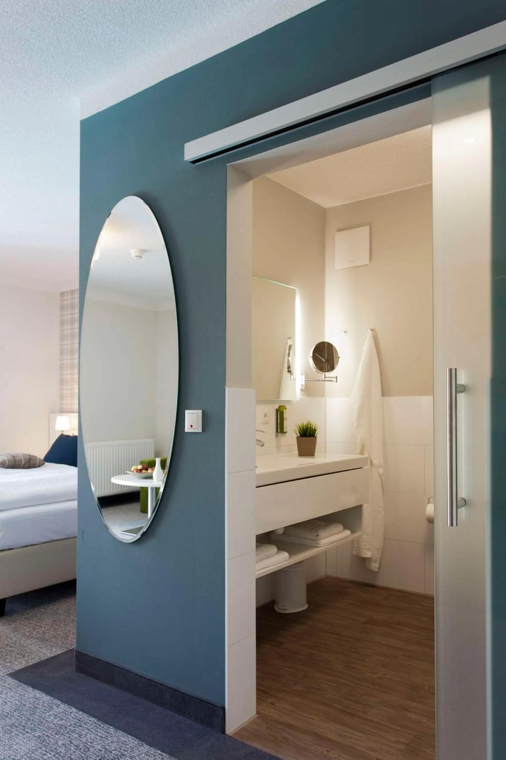 Bathroom, Bed in Dorint Resort Baltic Hills Usedom