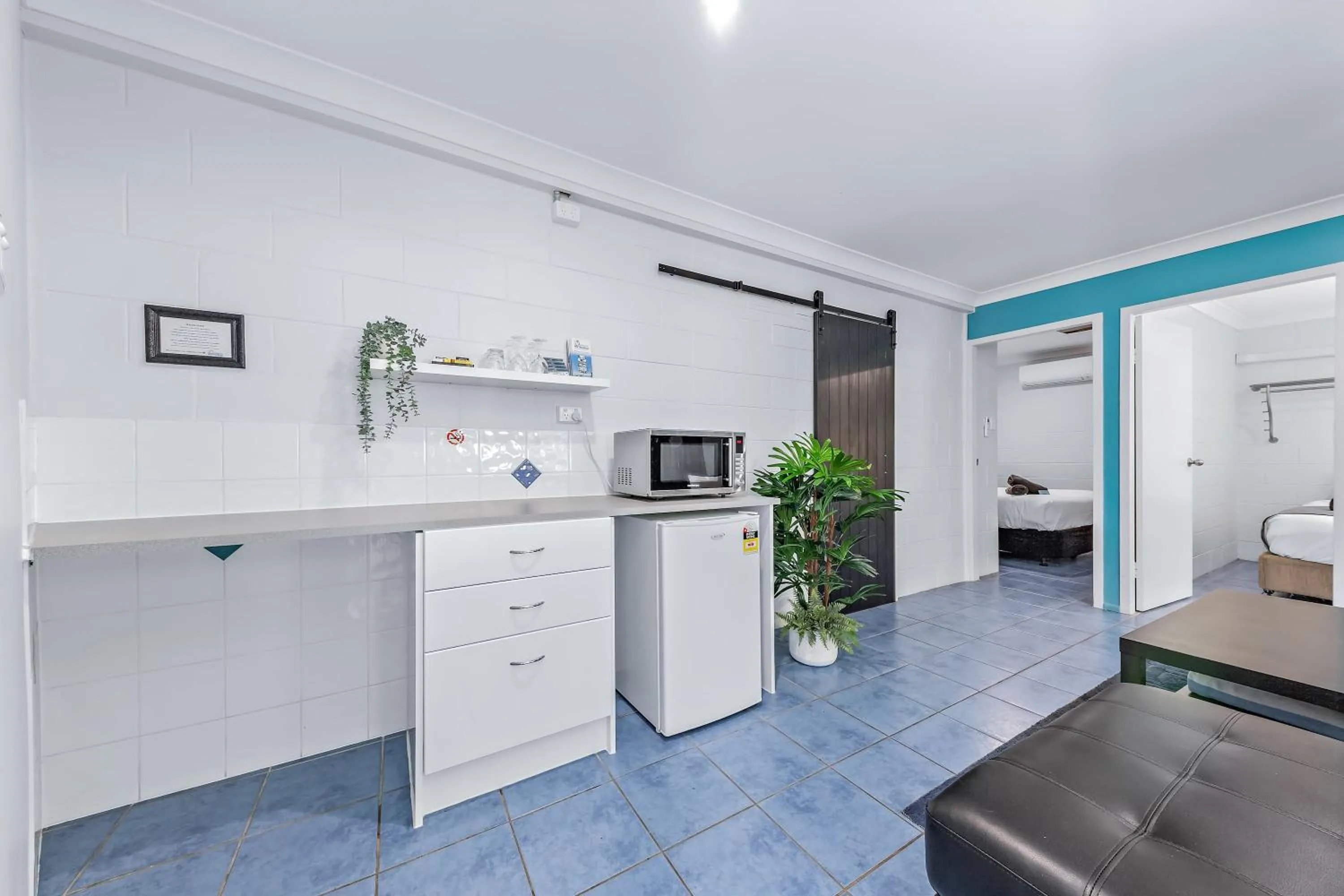 Bed in Airlie Sun & Sand Accommodation #6