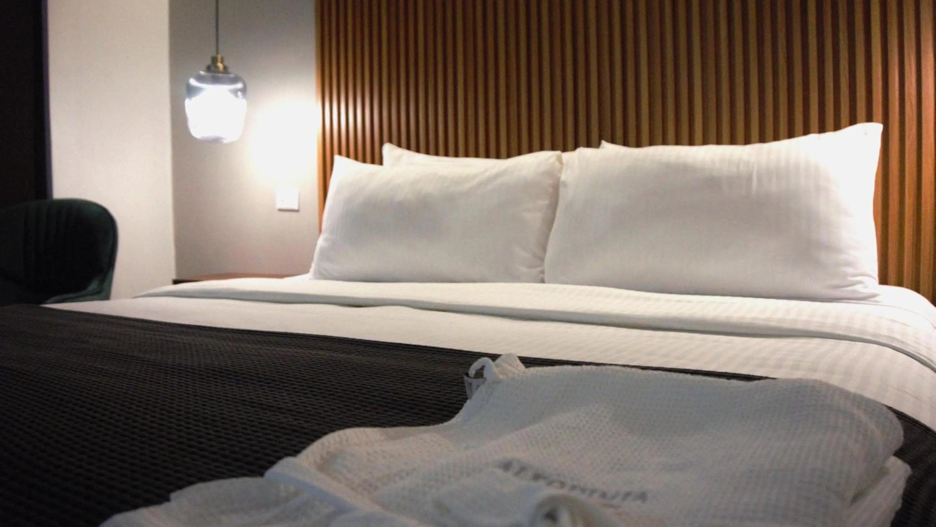 Bed in HOTEL ALKQUIMIA