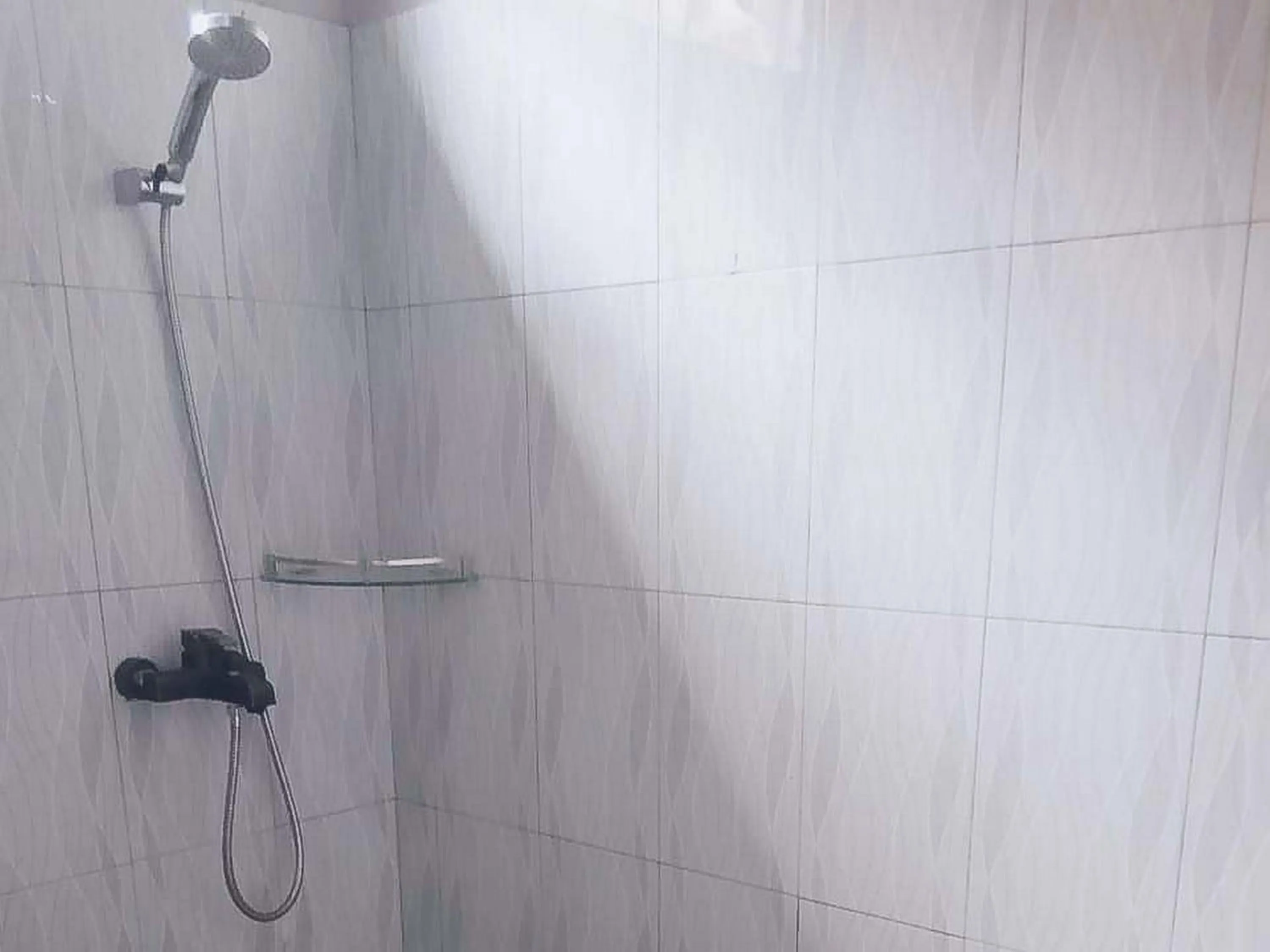 Bathroom in RedDoorz @ Jalan Pendidikan Mataram