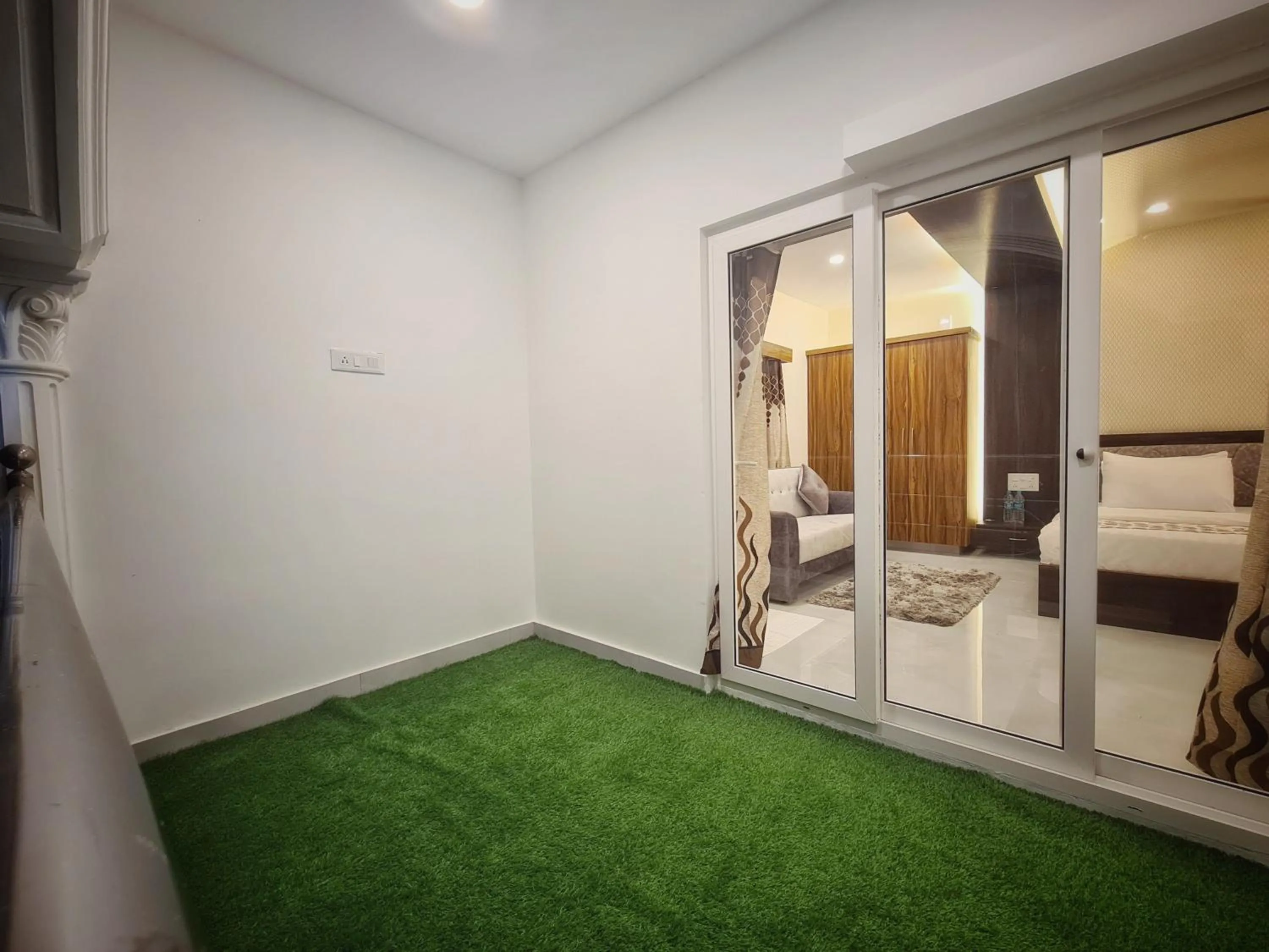 Balcony/Terrace, Bed in RK RESORTS