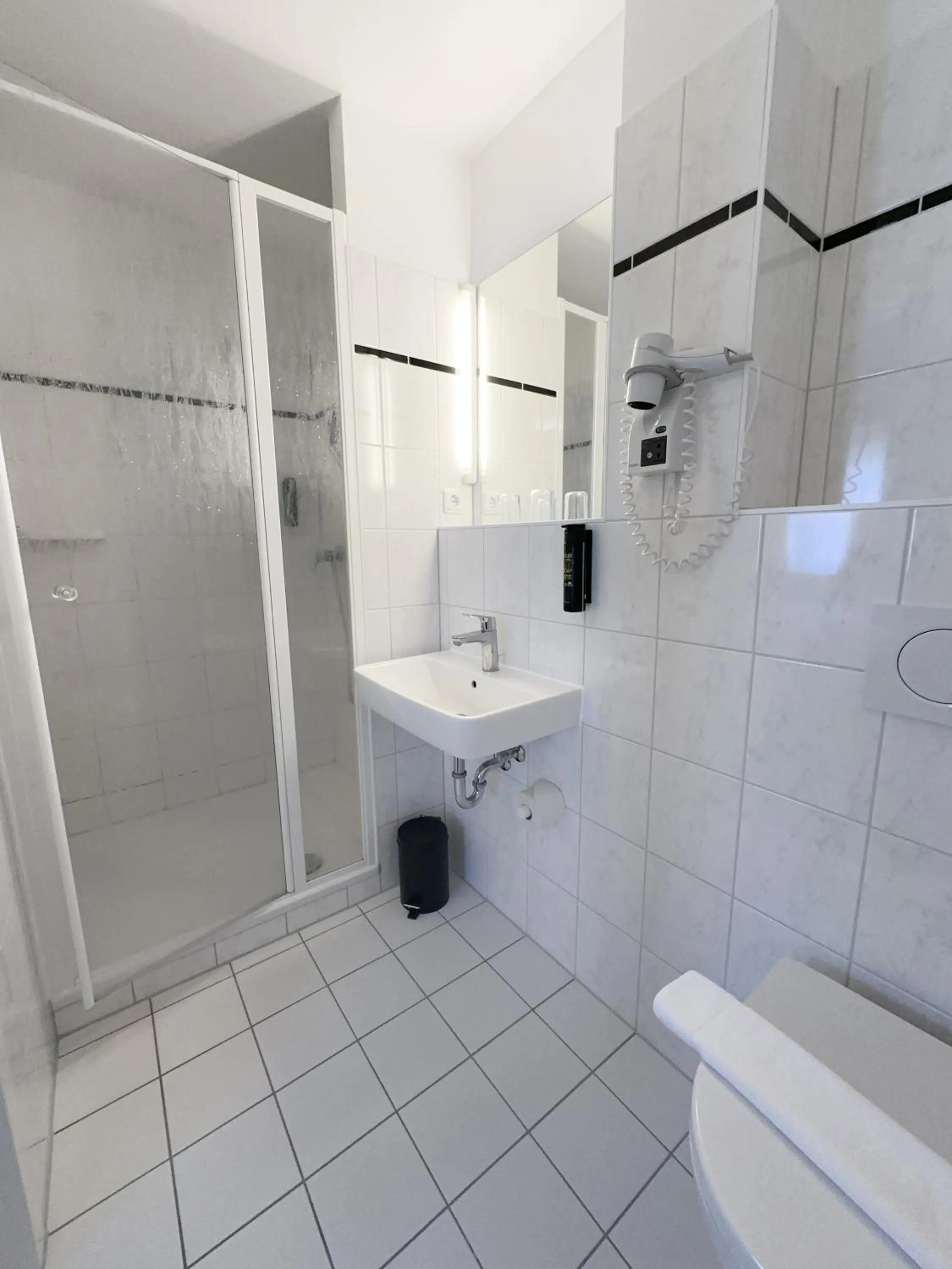 Bathroom in Hotel Berliner Hof by Coffee Fellows Hotels