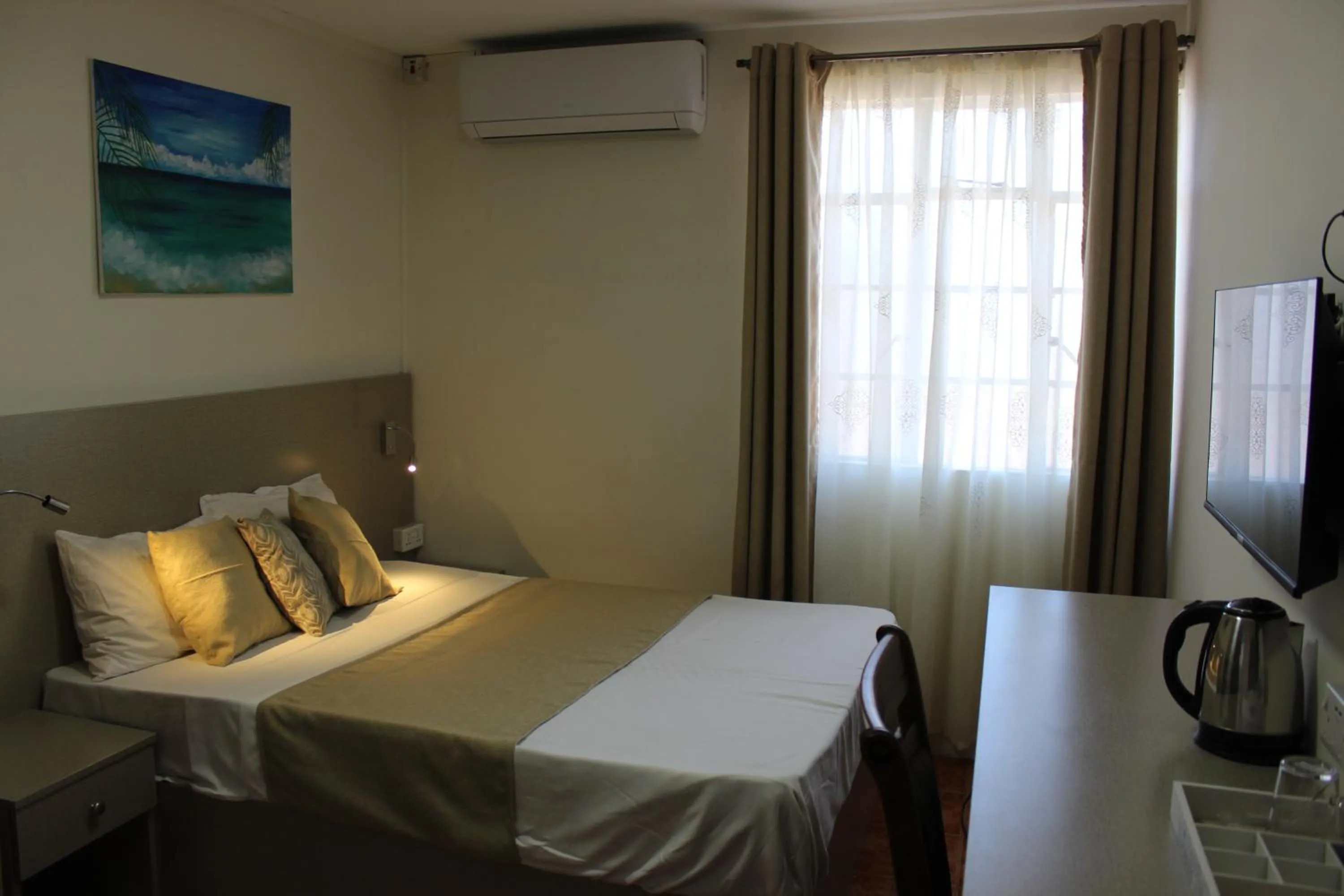 Coffee/tea facilities, Bed in Sikamifer Tourist Resort