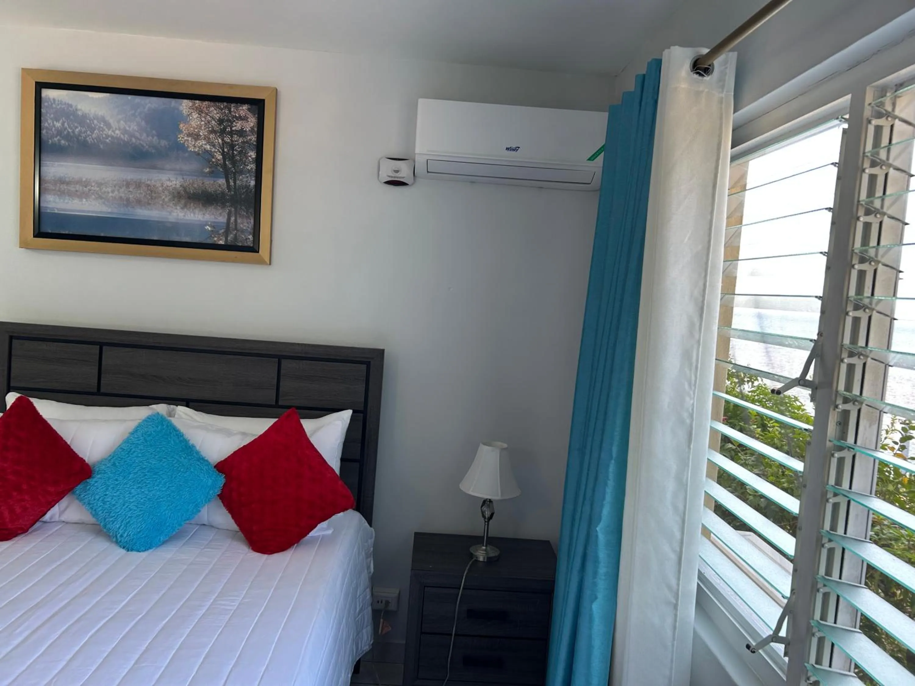 Bedroom, Bed in Contemporary Ocean view 2bed Carib Ocho Rios Condo