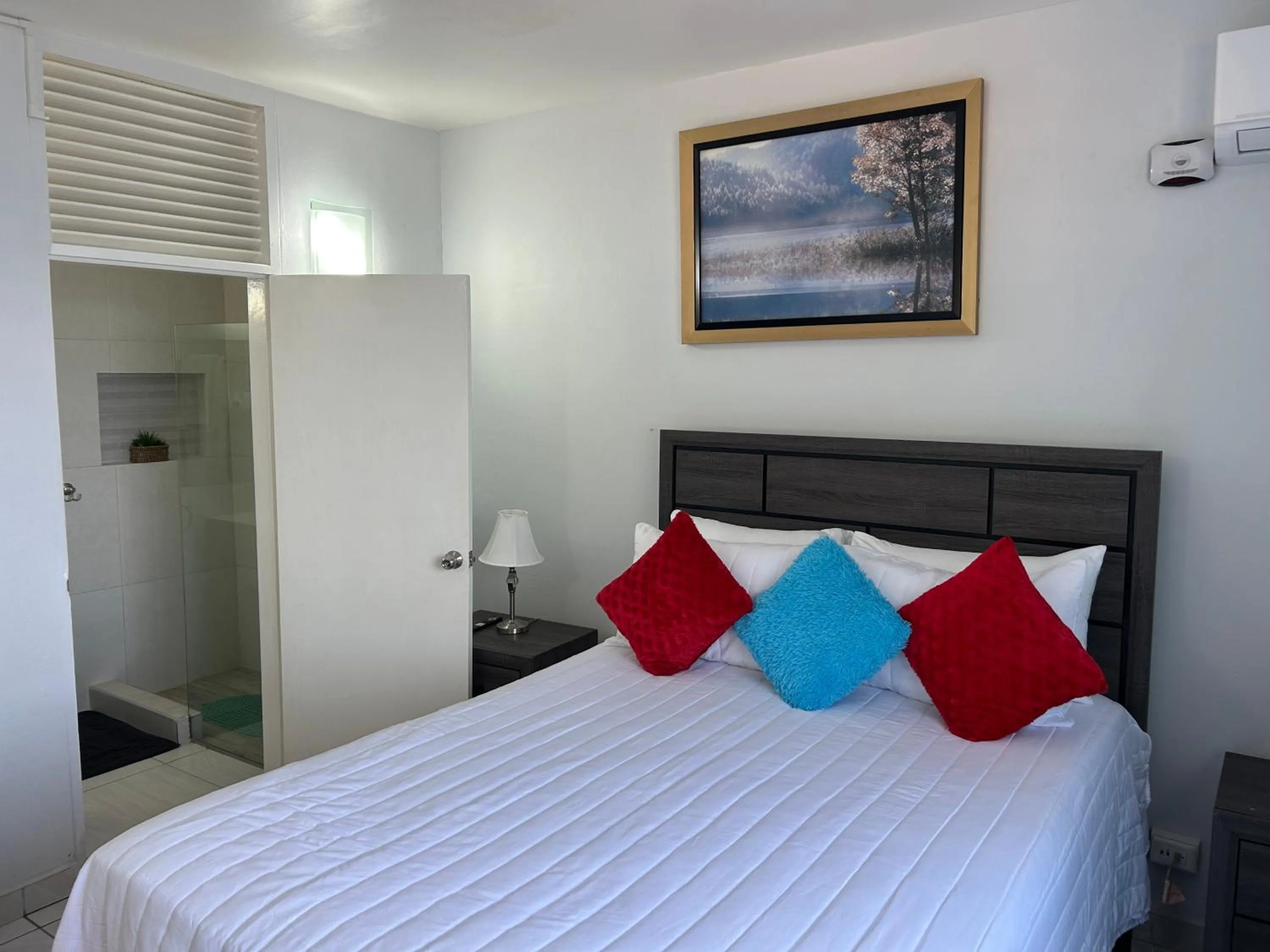 Bedroom, Bed in Contemporary Ocean view 2bed Carib Ocho Rios Condo