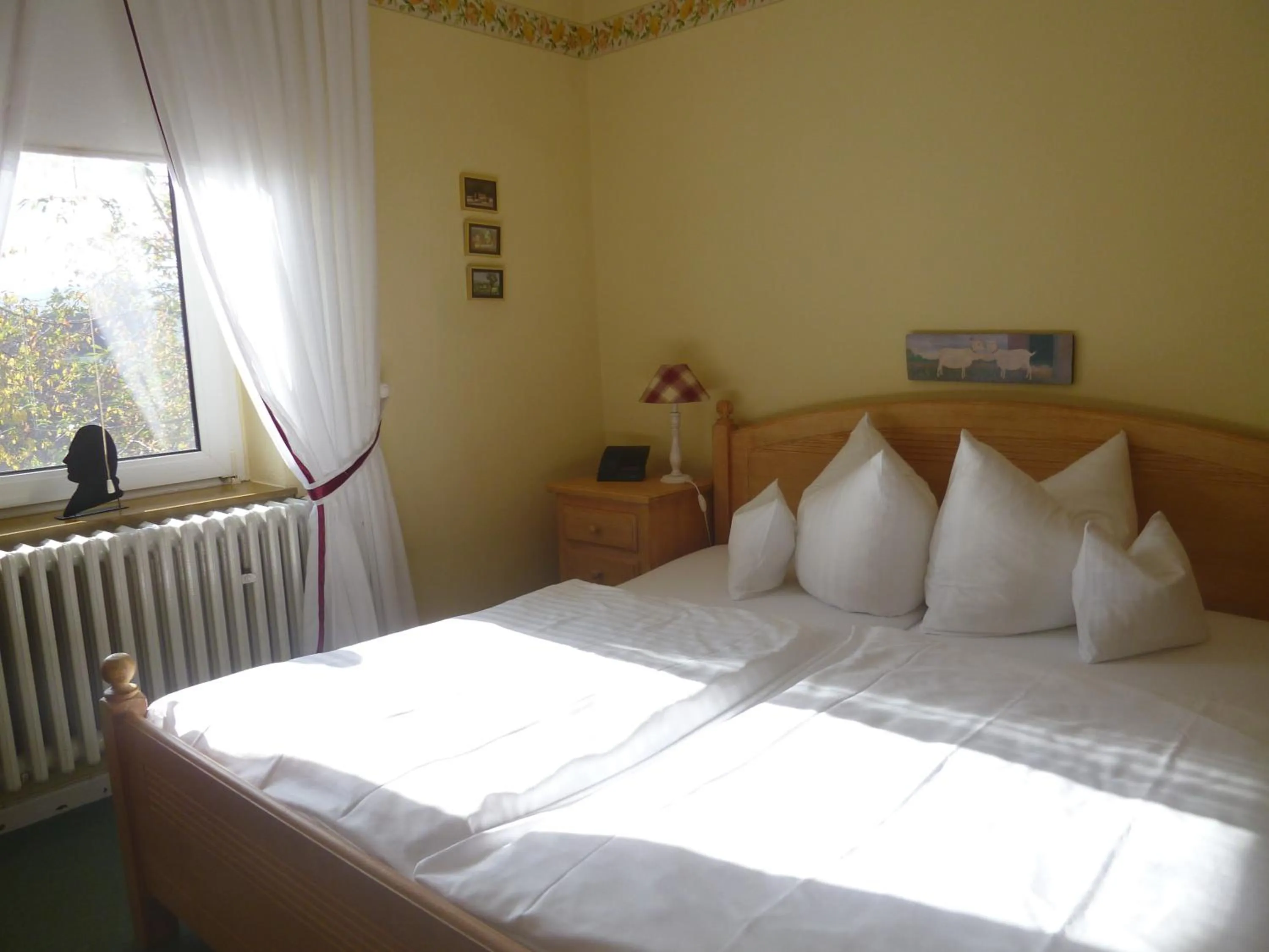 Bed in Hotel Landhaus Lahmann