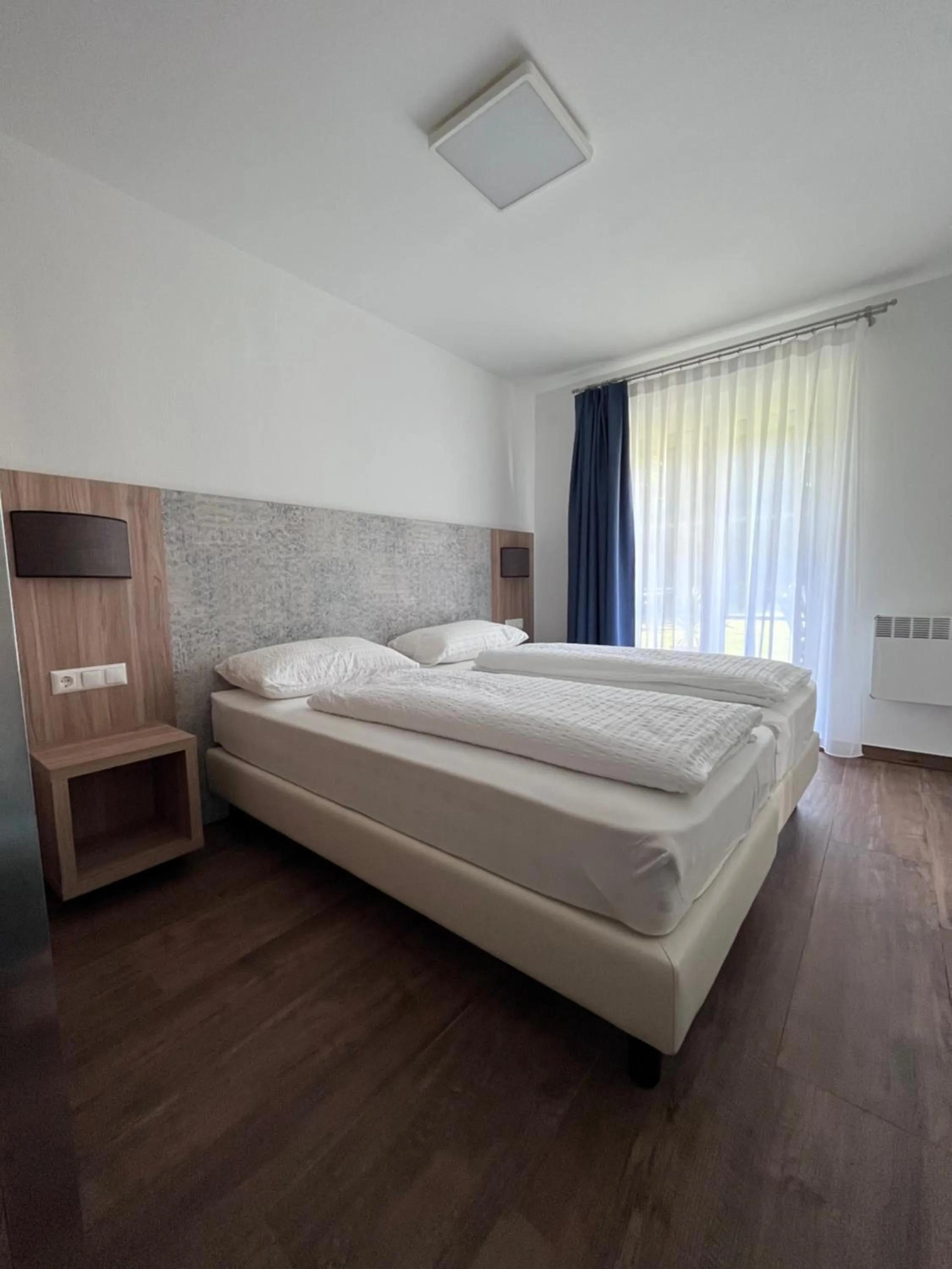 Bed in Apartments Roemerschlucht