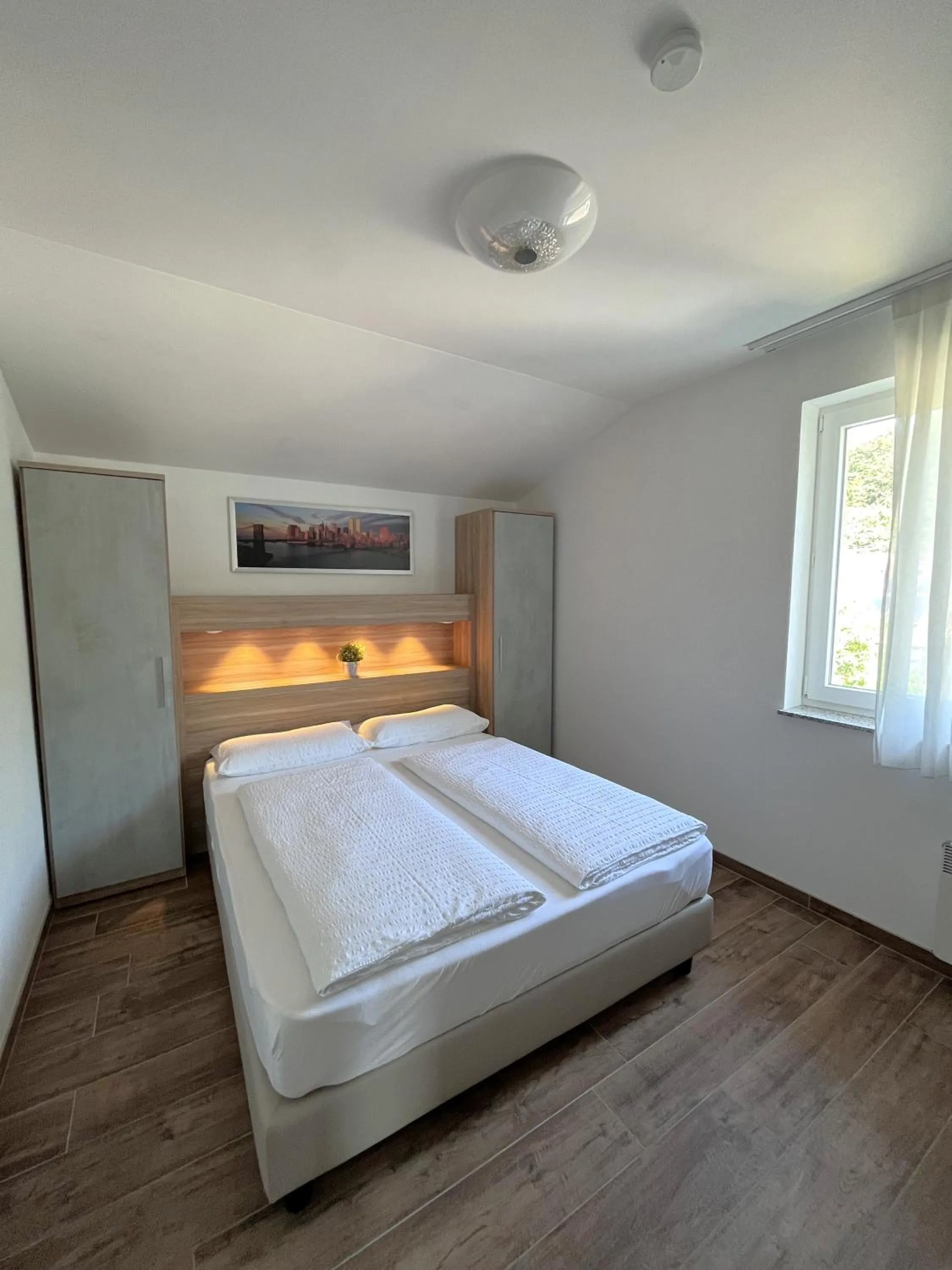 Bed in Apartments Roemerschlucht