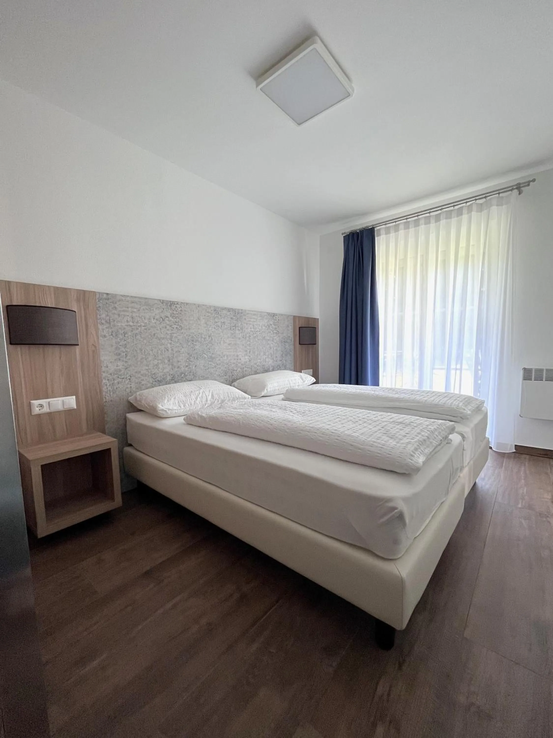 Bed in Apartments Roemerschlucht