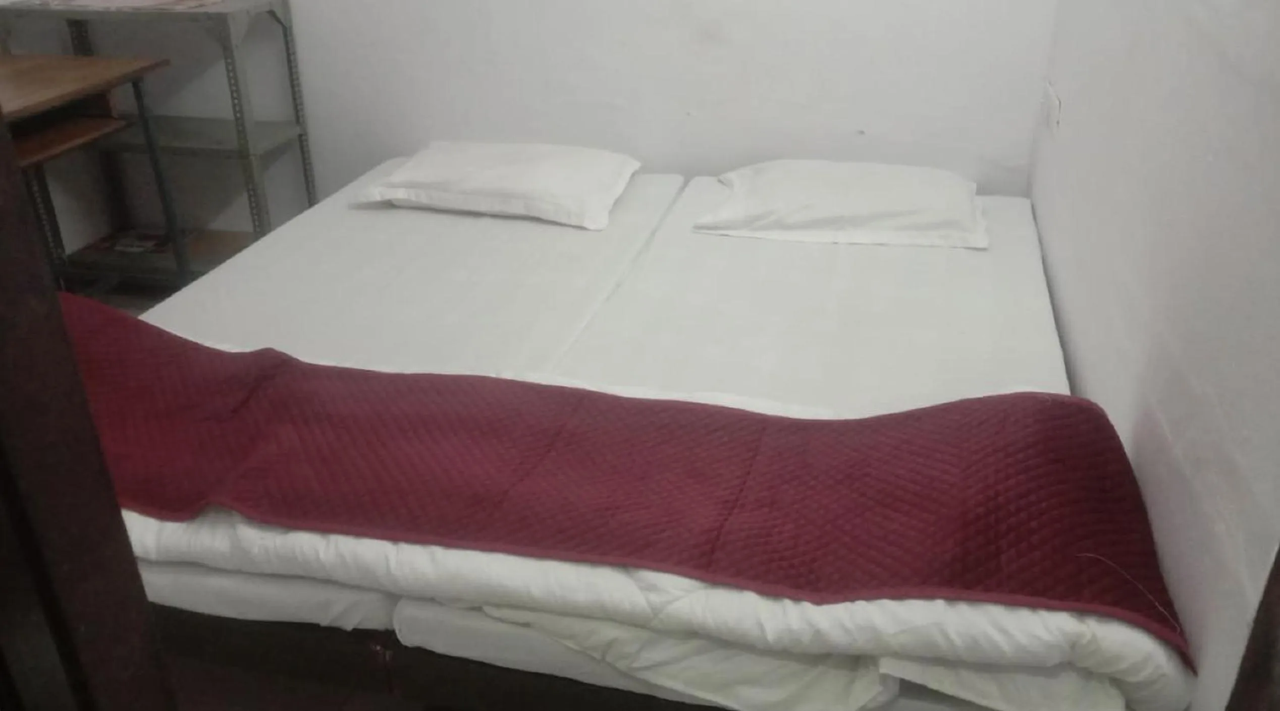Bed in Ashish Guest House, Goverdhan Vilas