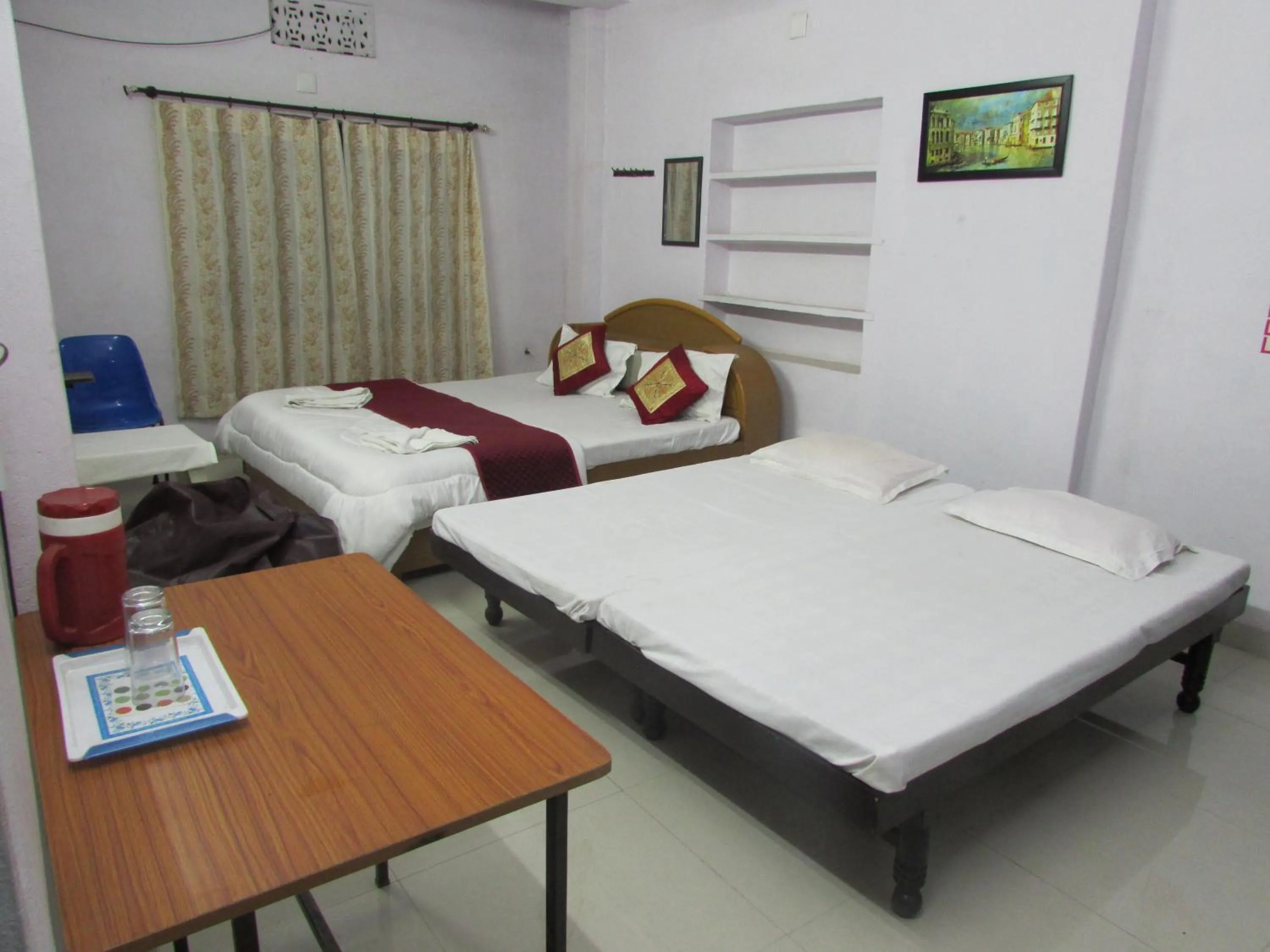 Bed in Ashish Guest House, Goverdhan Vilas