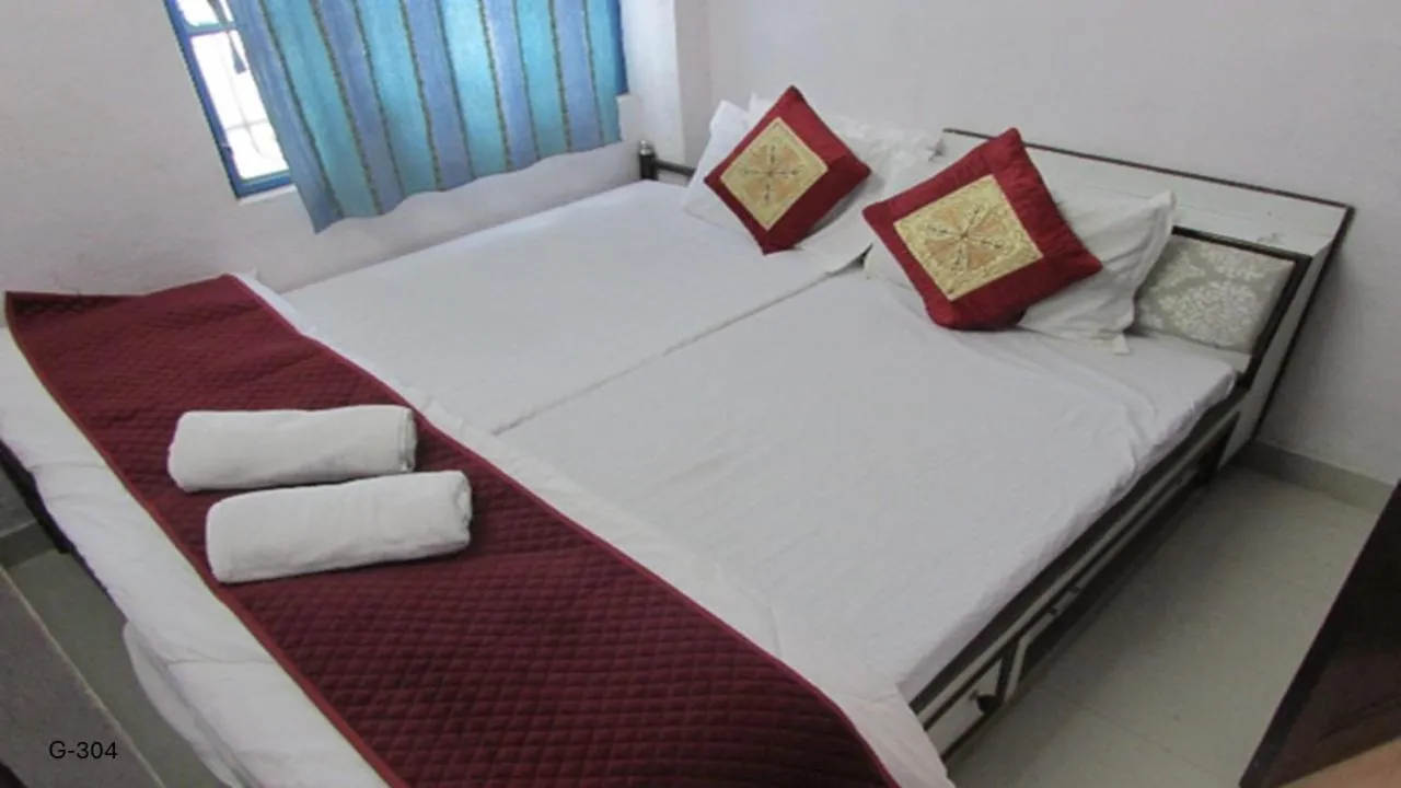 Bed in Ashish Guest House, Goverdhan Vilas