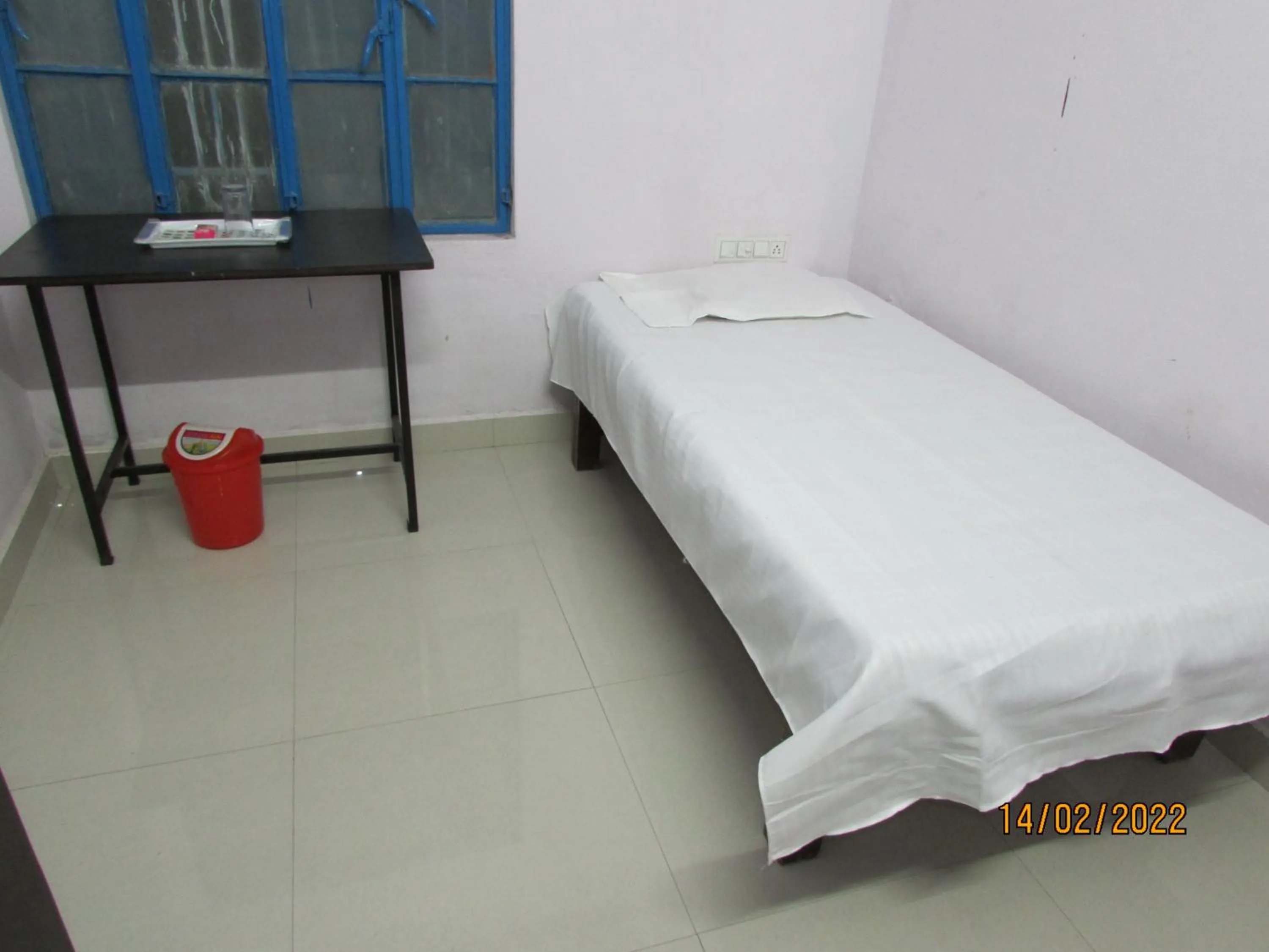 Bed in Ashish Guest House, Goverdhan Vilas