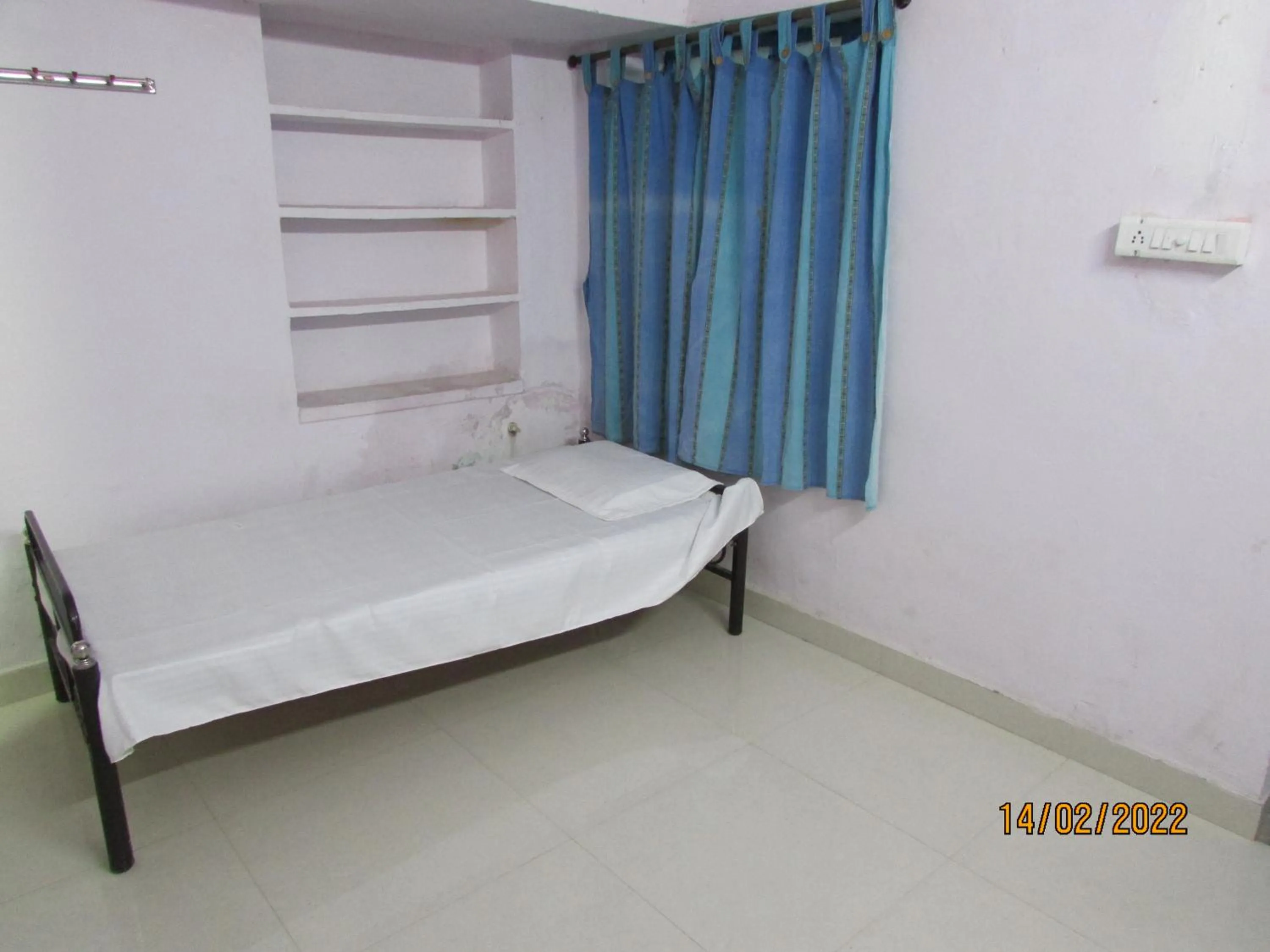 Bed in Ashish Guest House, Goverdhan Vilas