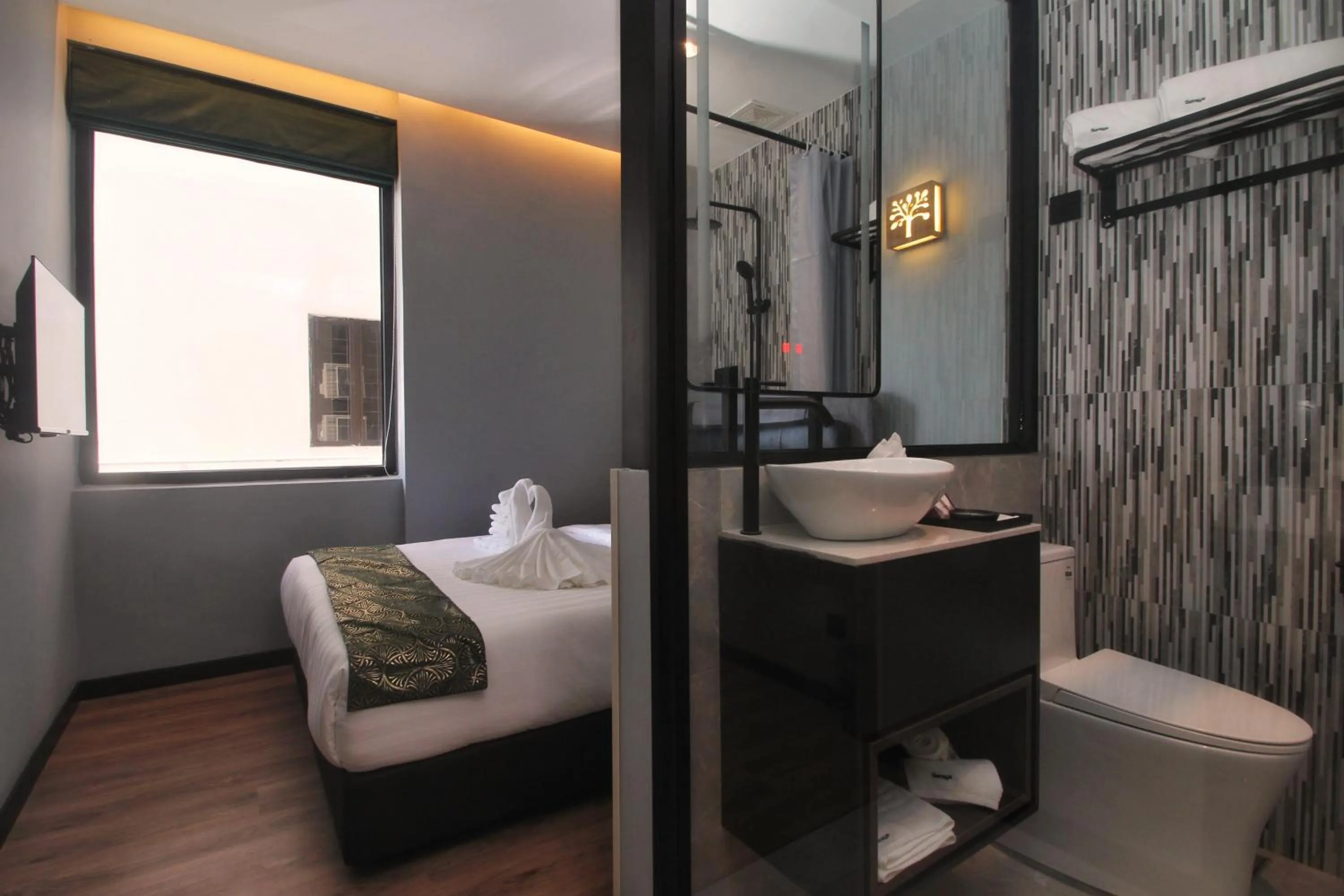 Bathroom, Bed in The Seraya Hotel