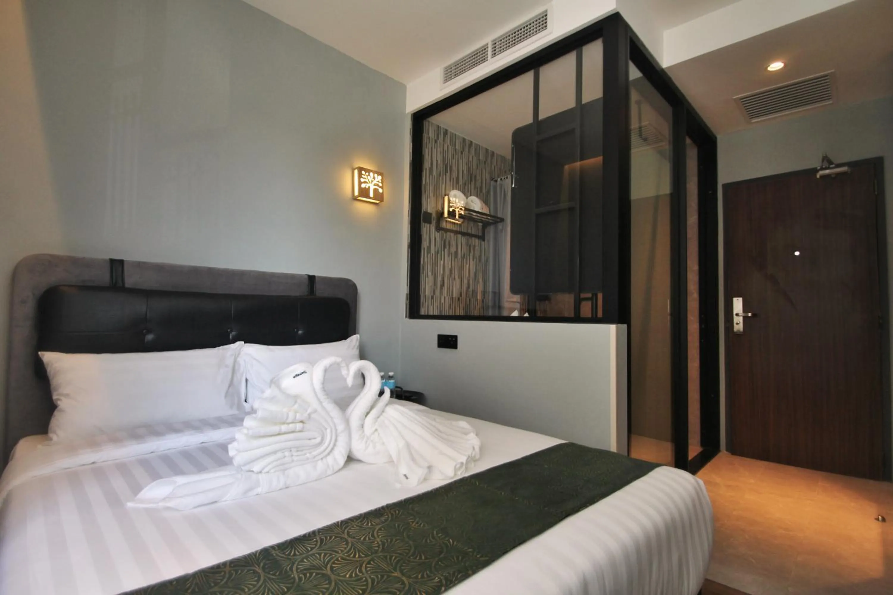 Bed in The Seraya Hotel