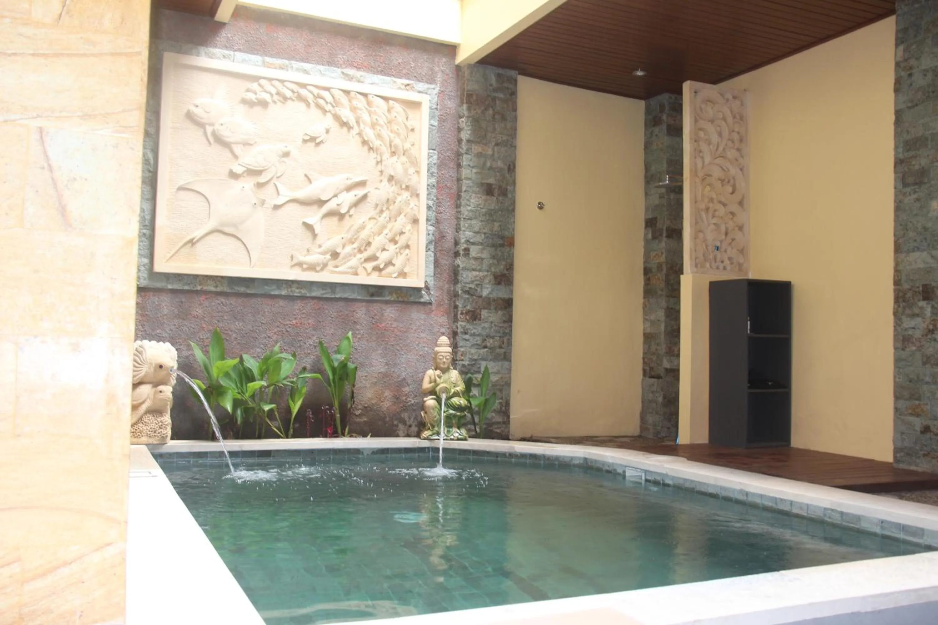 Swimming pool in The Garuda Homestay Sanur