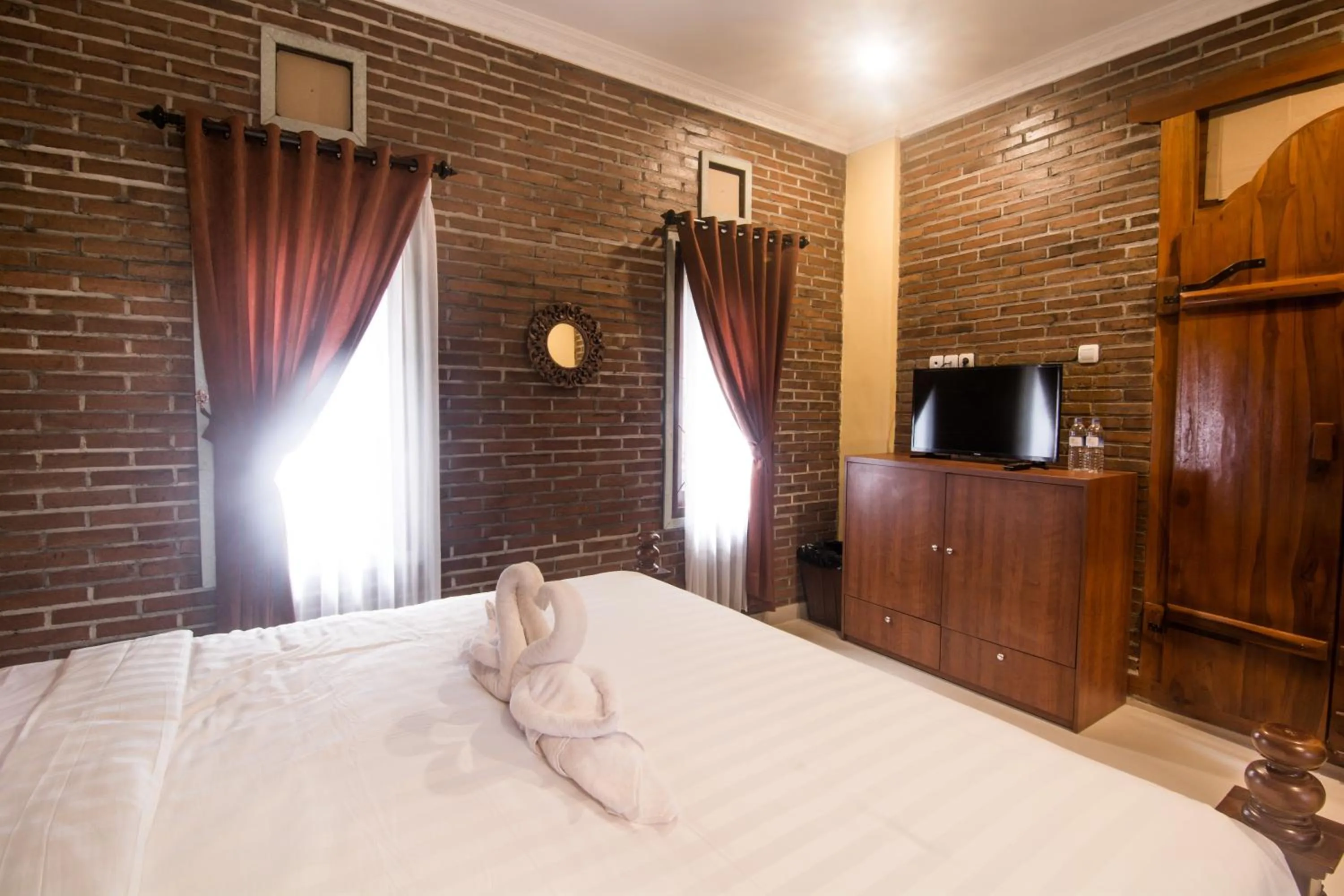 Bed in The Garuda Homestay Sanur