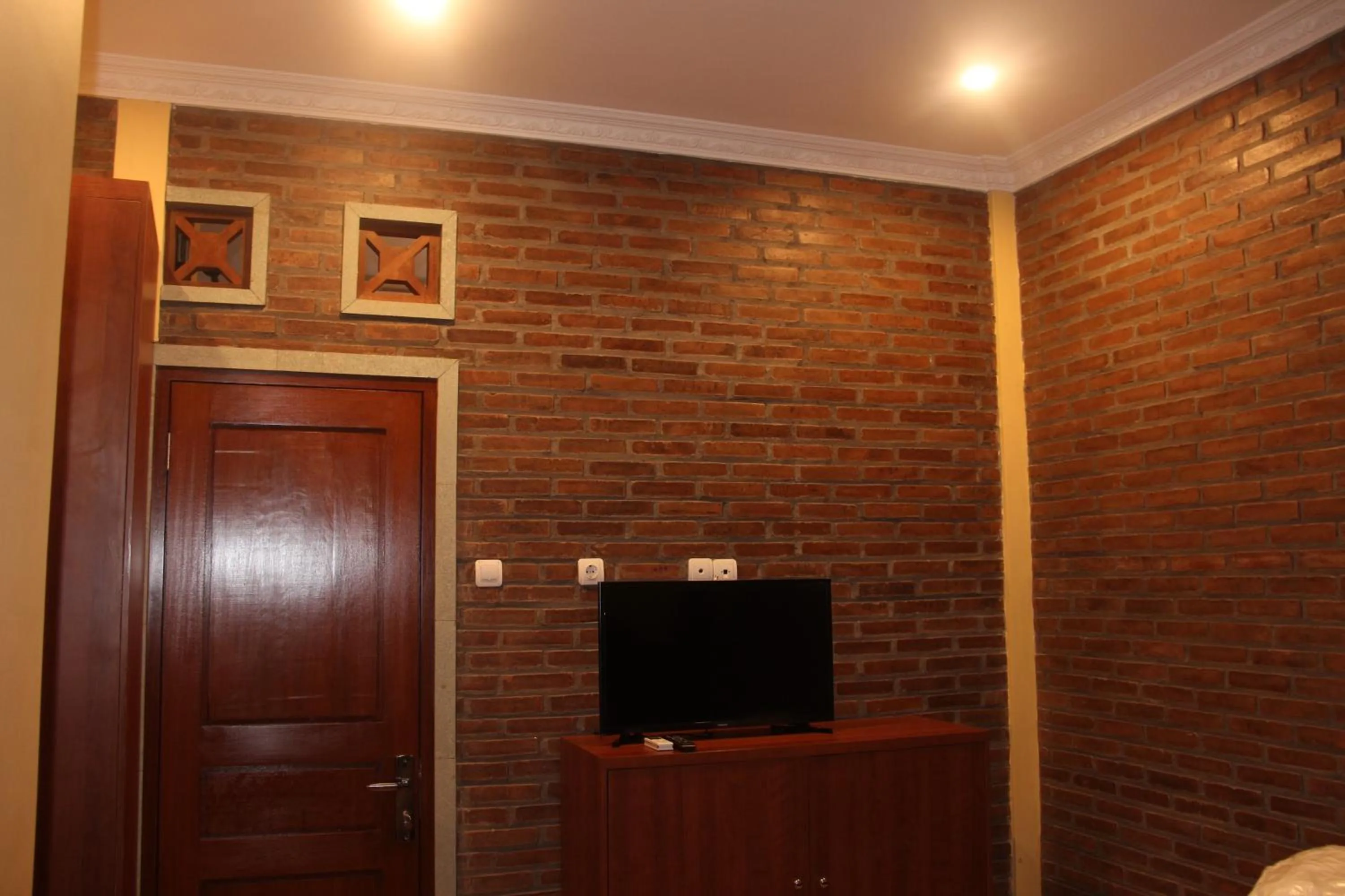 TV and multimedia in The Garuda Homestay Sanur