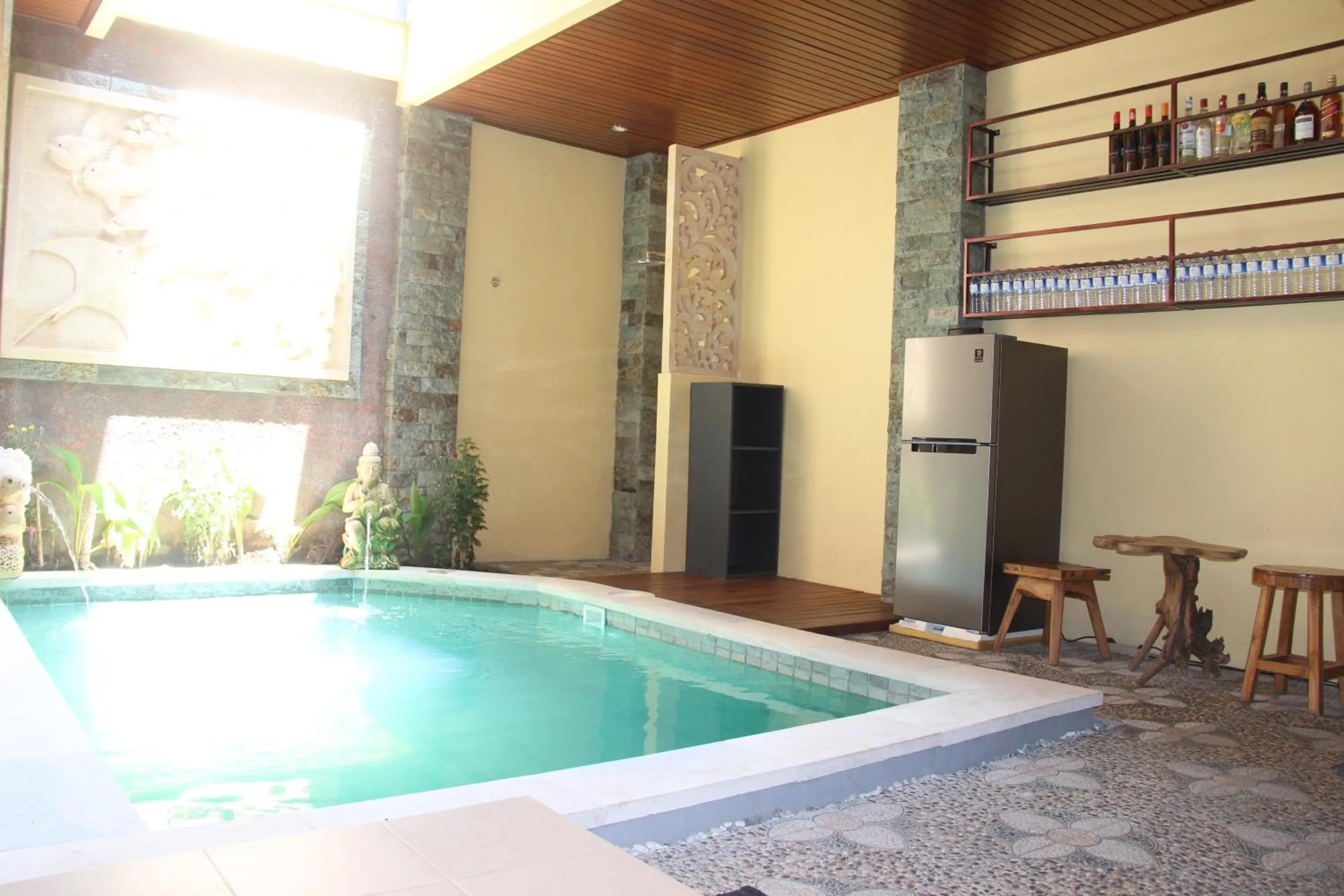 Swimming pool in The Garuda Homestay Sanur