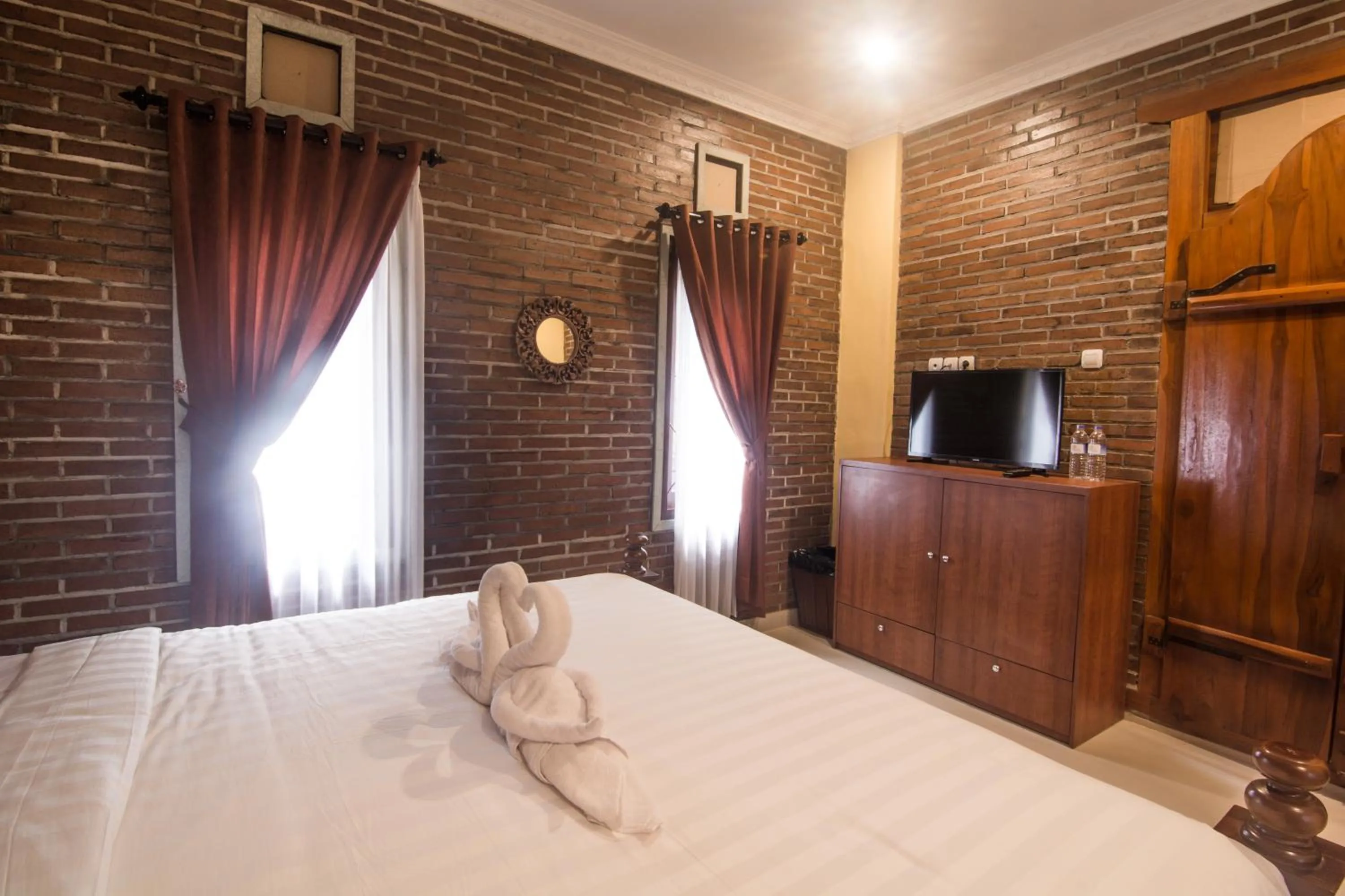 Bed in The Garuda Homestay Sanur