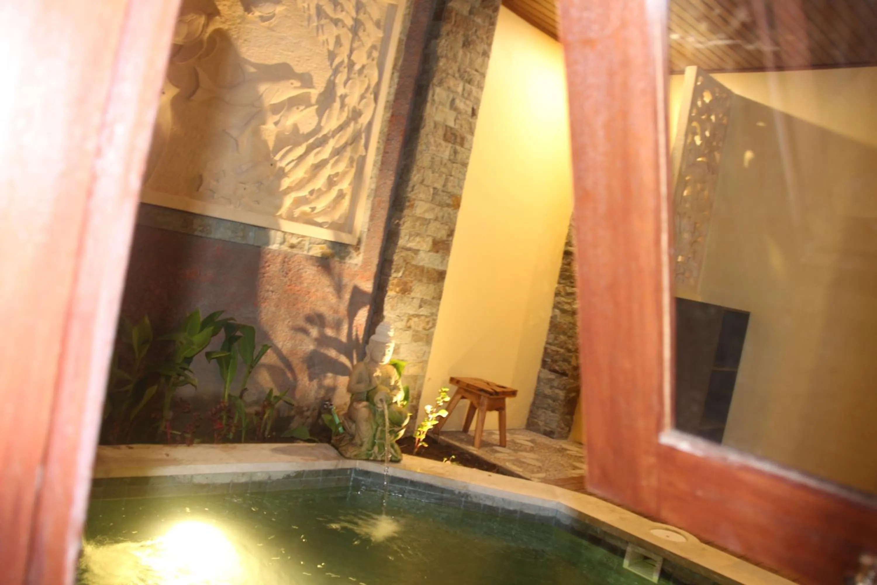 Swimming pool in The Garuda Homestay Sanur