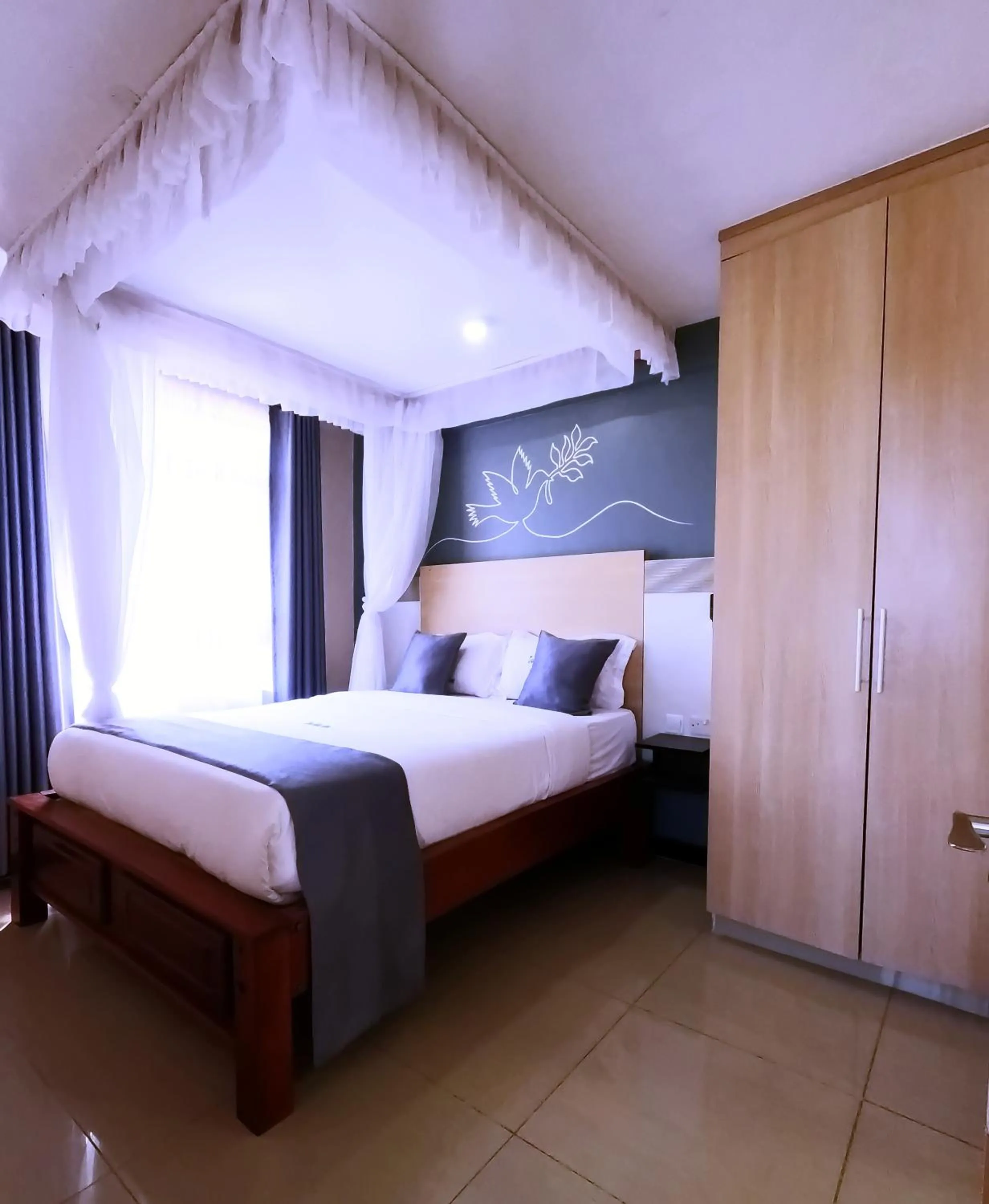 Bed in Divine Homes Resort Kisumu