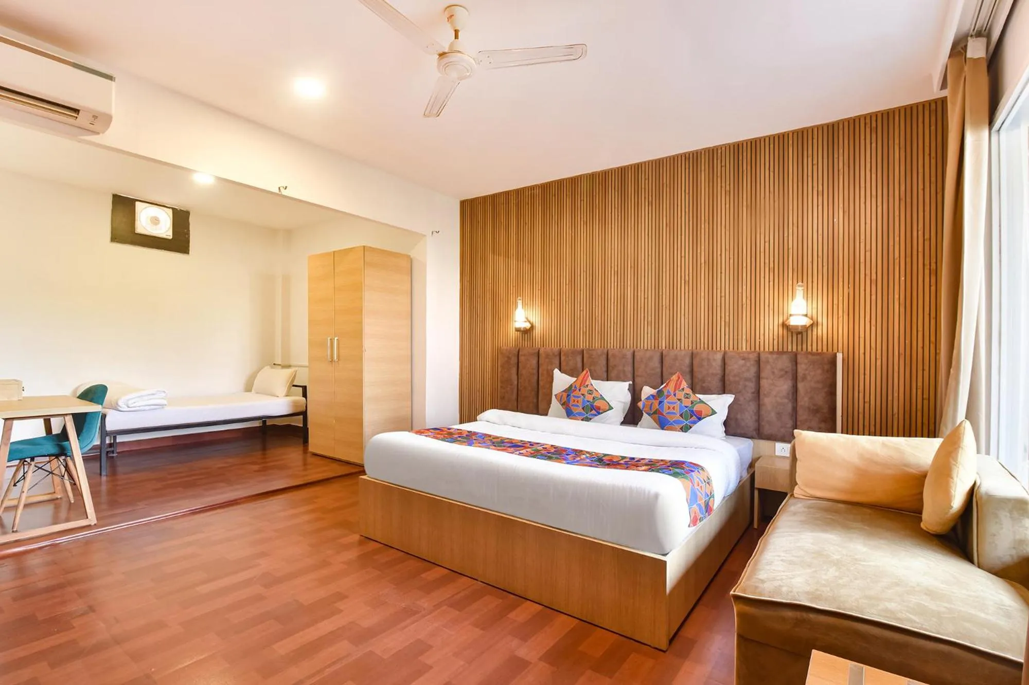 Bed in FabHotel Morjim Bliss