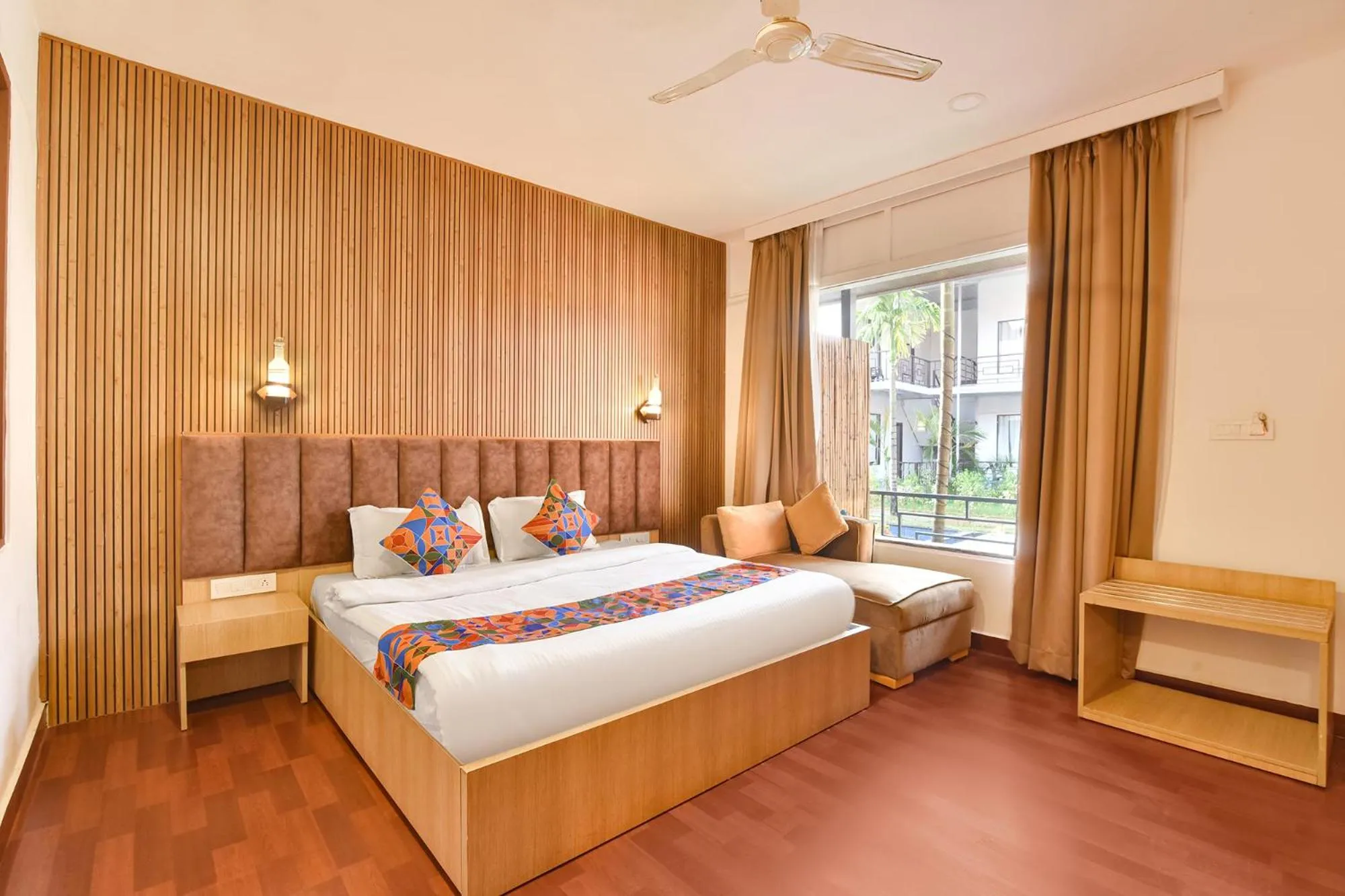 Bed in FabHotel Morjim Bliss