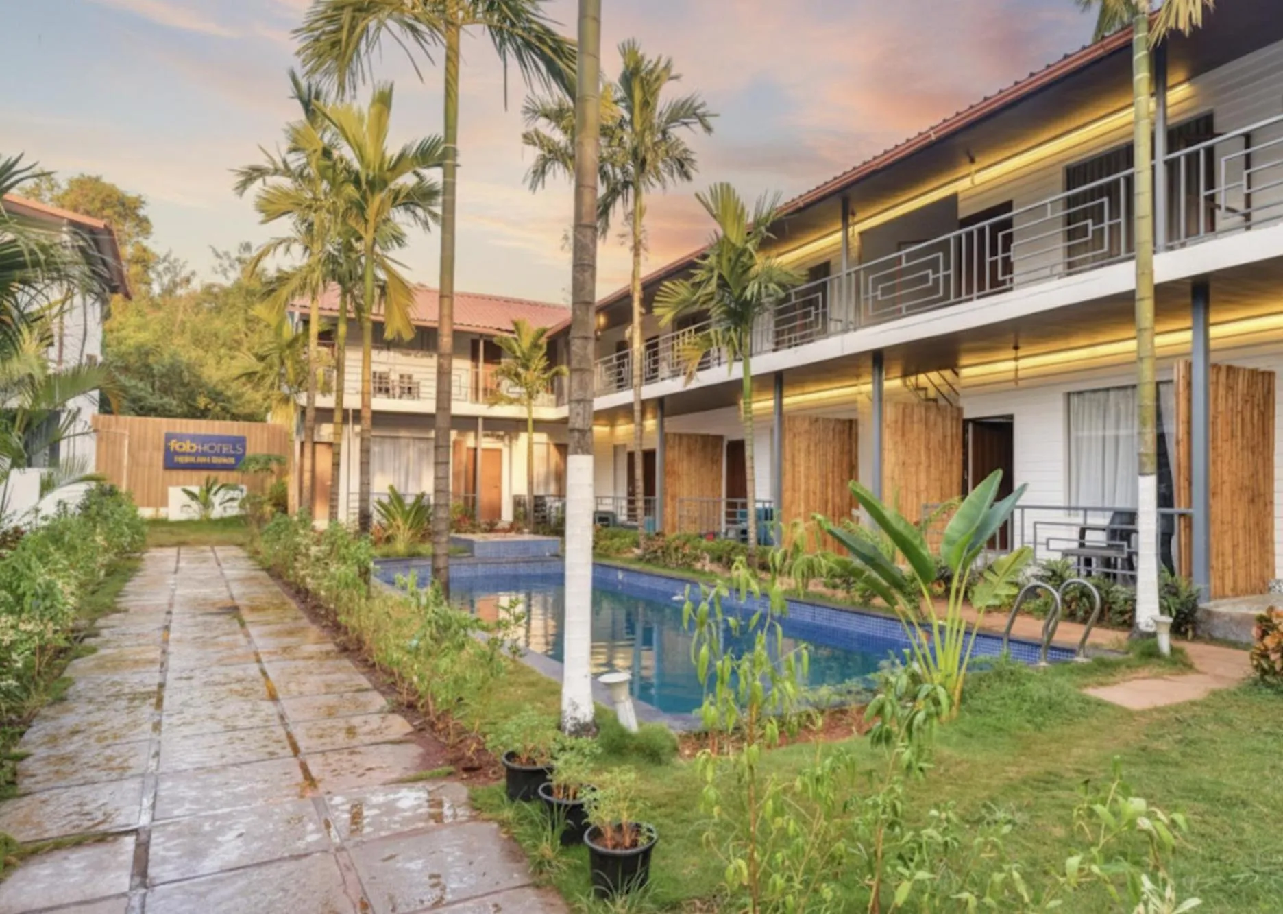 Swimming pool in FabHotel Morjim Bliss