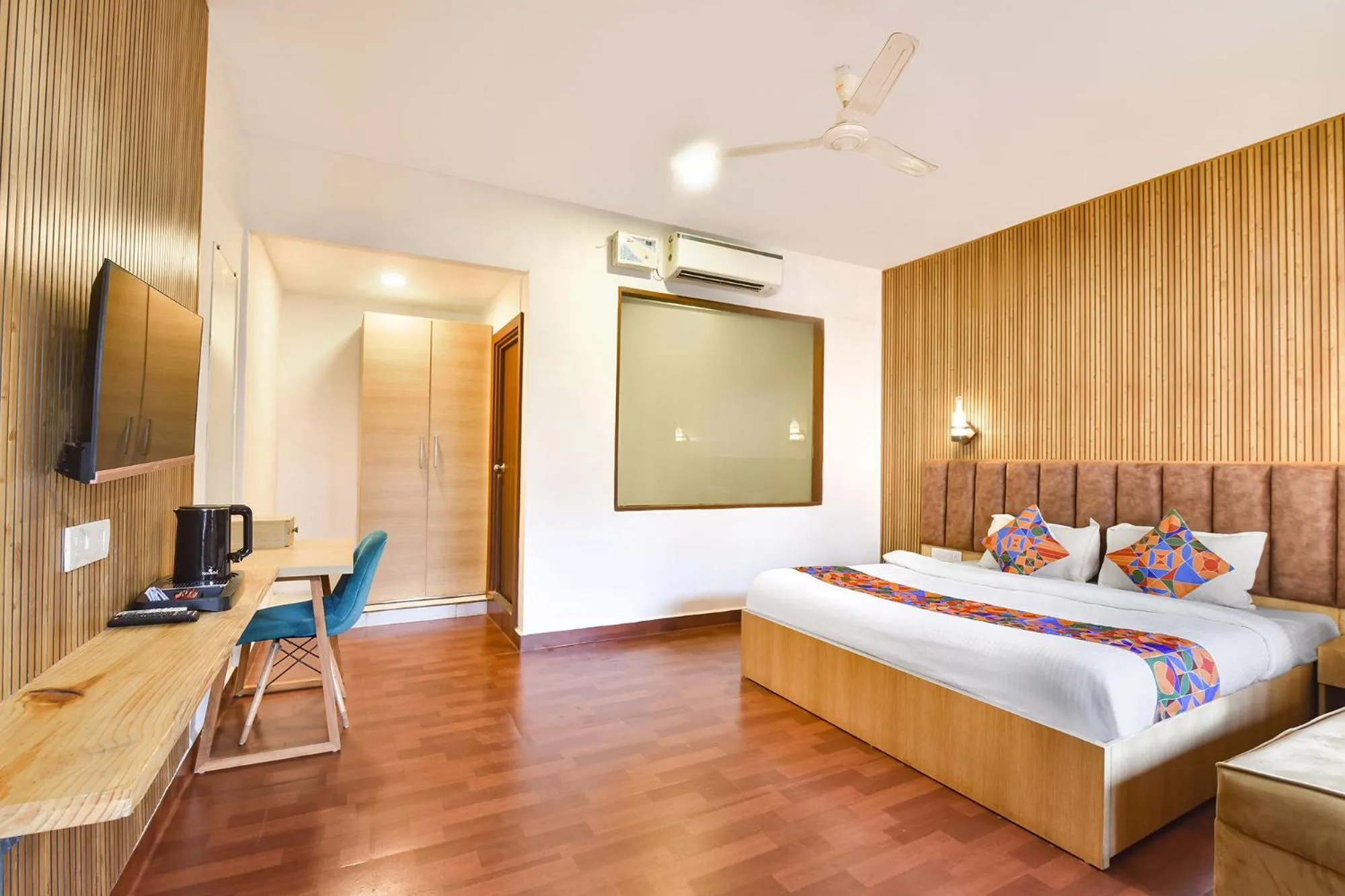 Bed in FabHotel Morjim Bliss