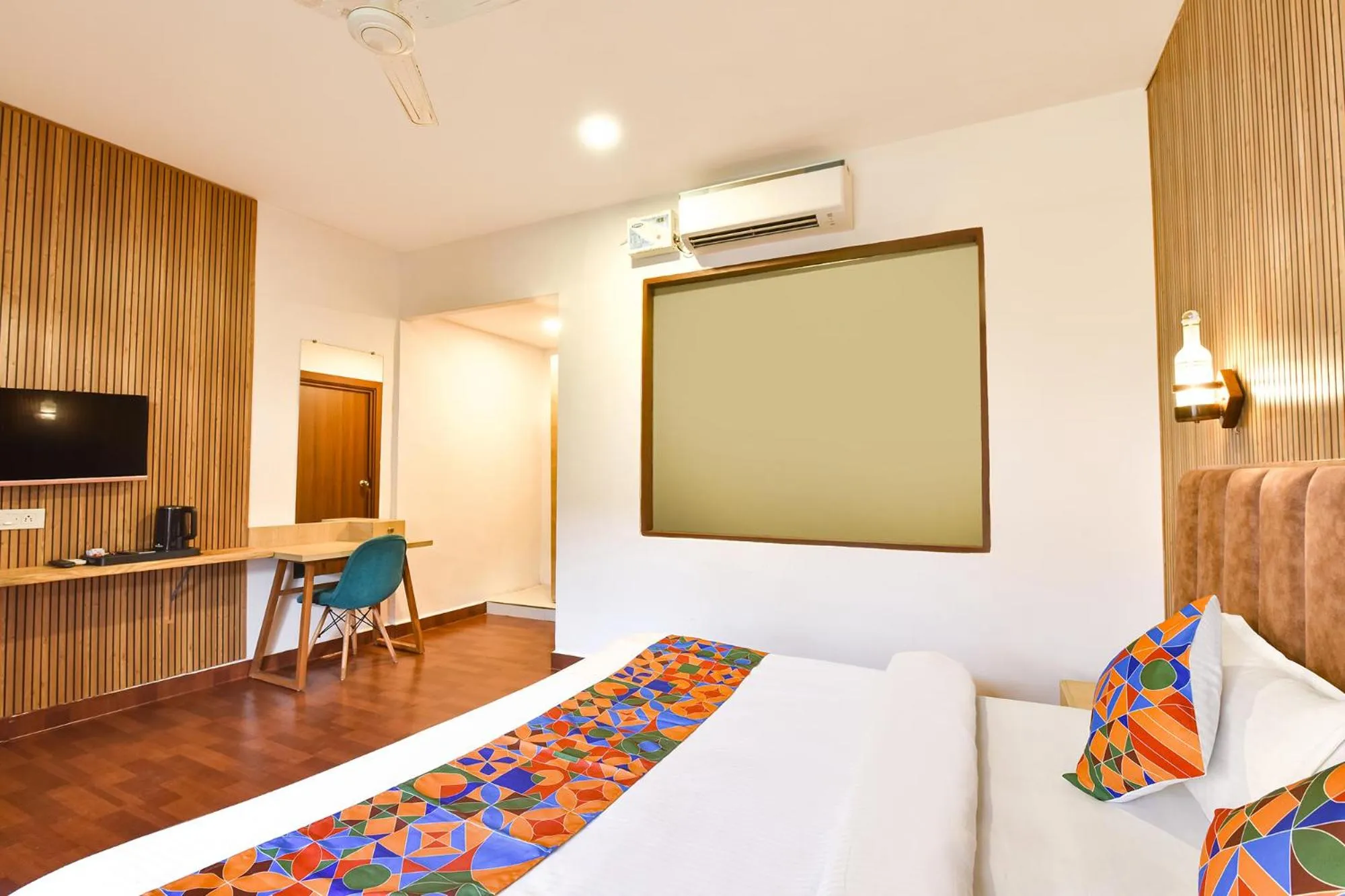 Bed in FabHotel Morjim Bliss