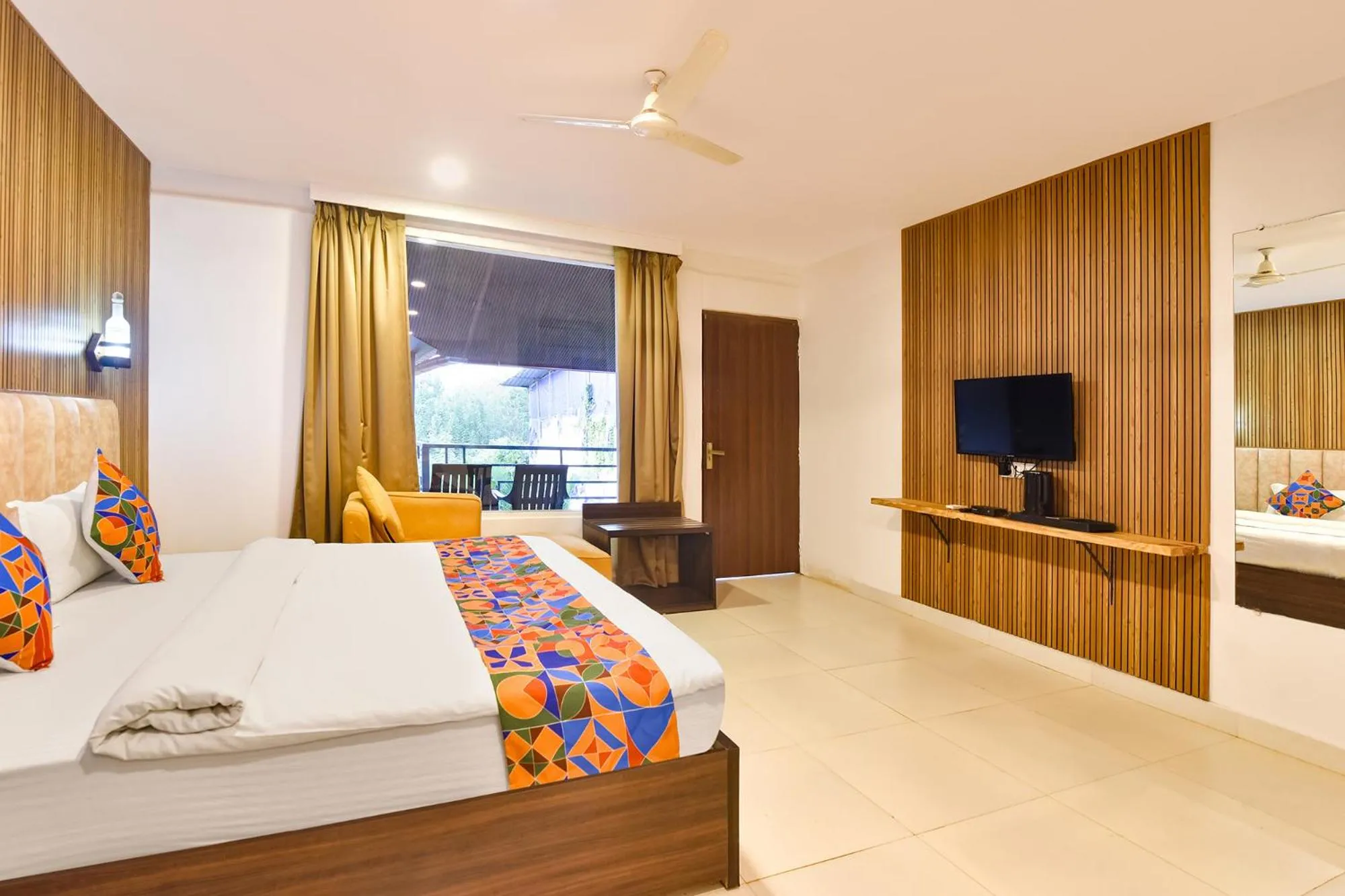 Bed in FabHotel Morjim Bliss