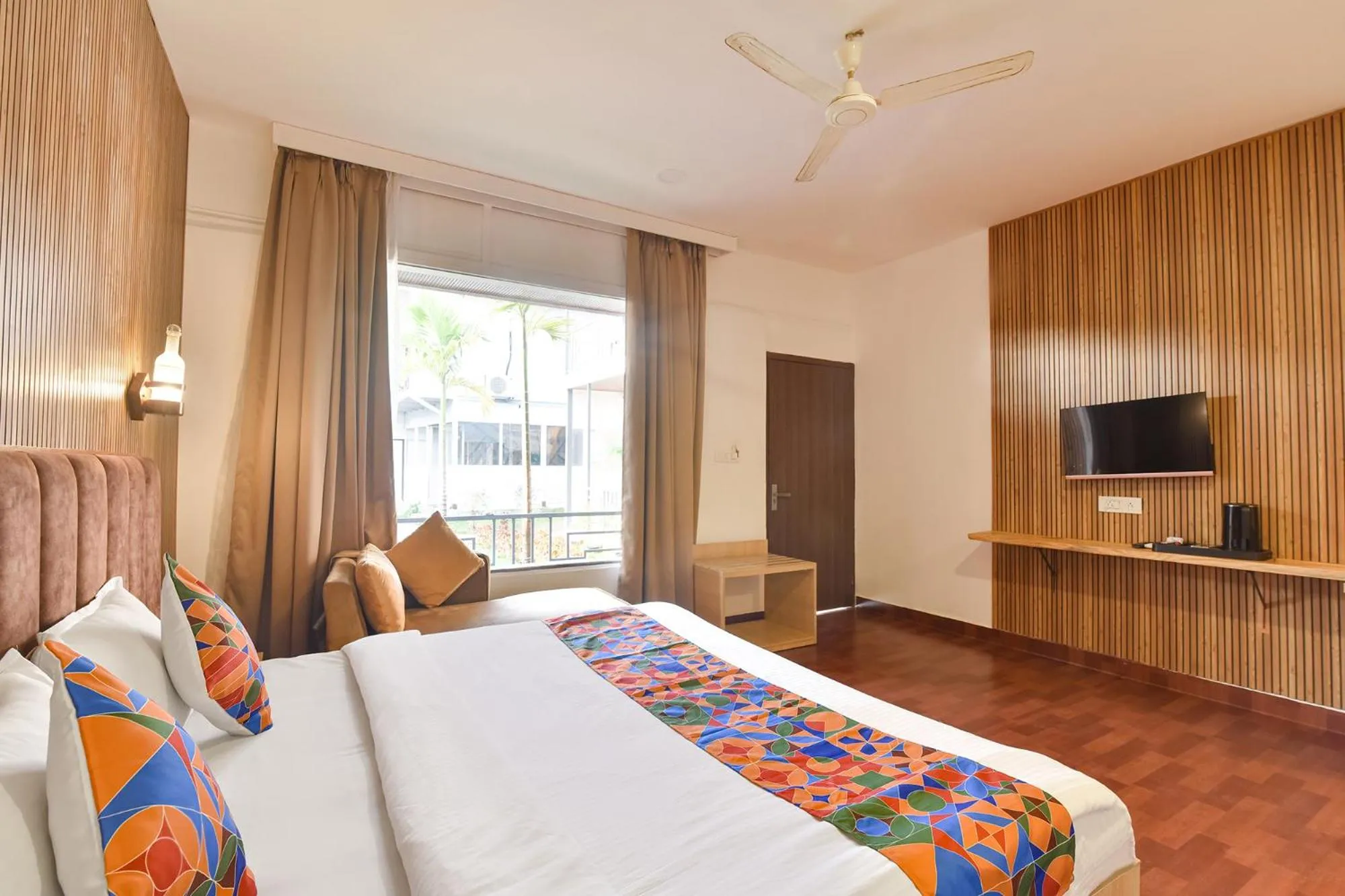 Bed in FabHotel Morjim Bliss