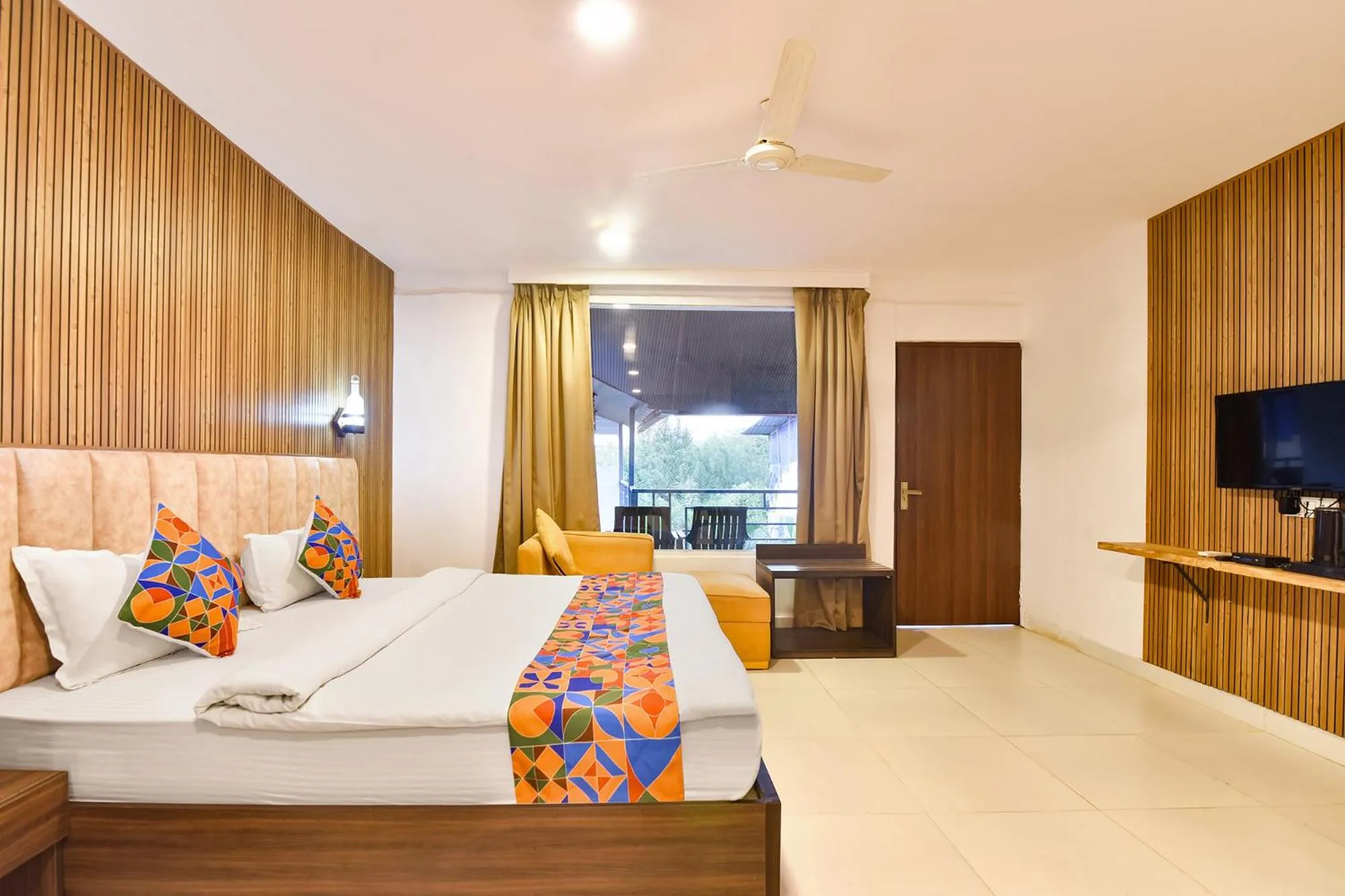 Bed in FabHotel Morjim Bliss