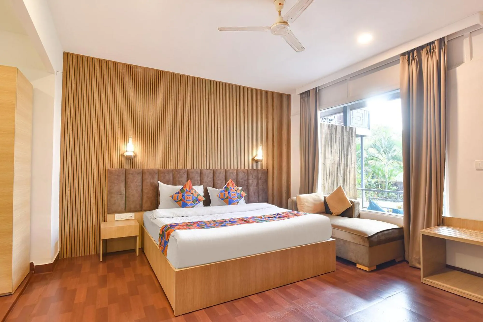 Bed in FabHotel Morjim Bliss