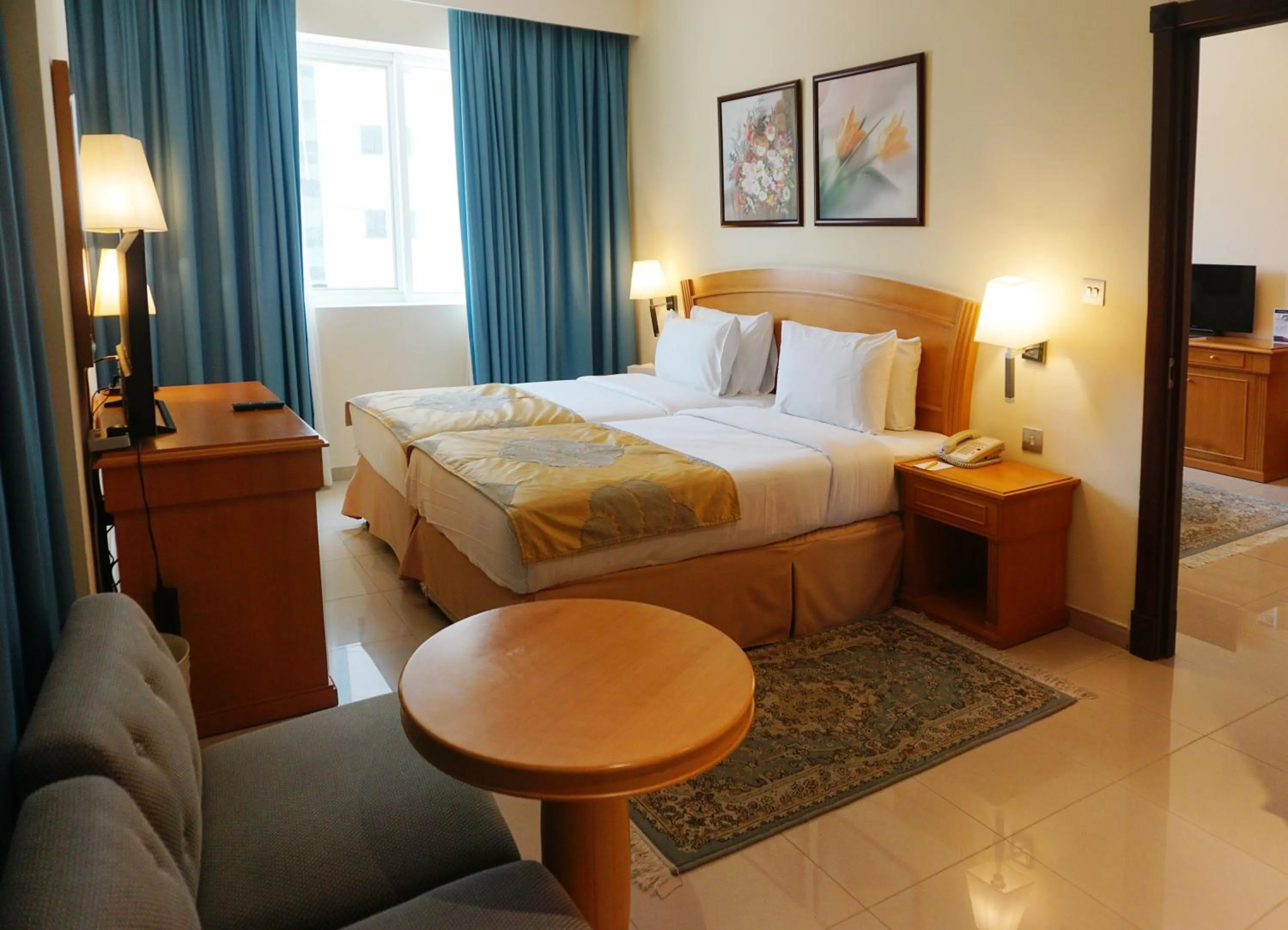 Bed in Golden Tulip Sharjah