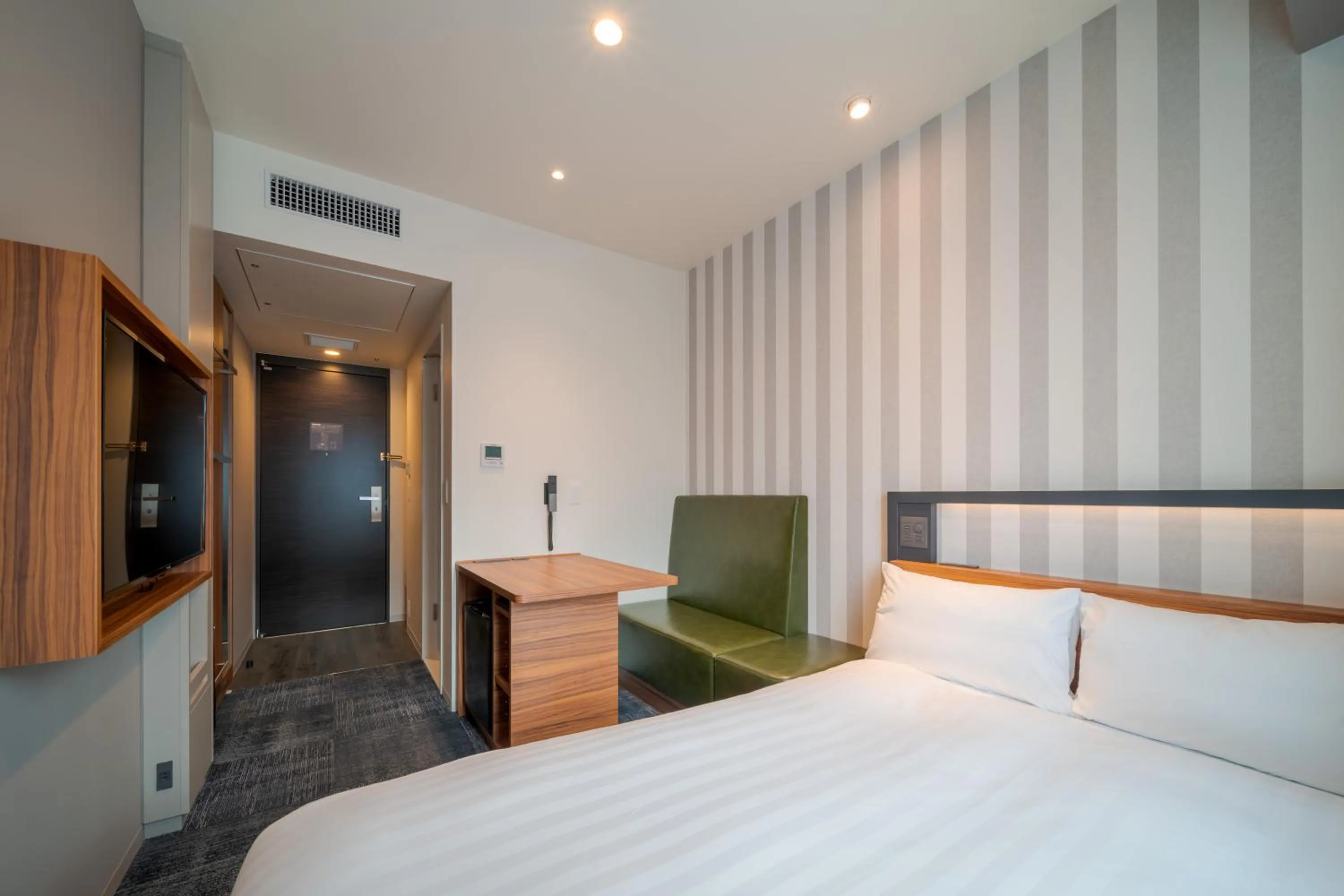 Bed in Via Inn Prime Osaka Kyobashi