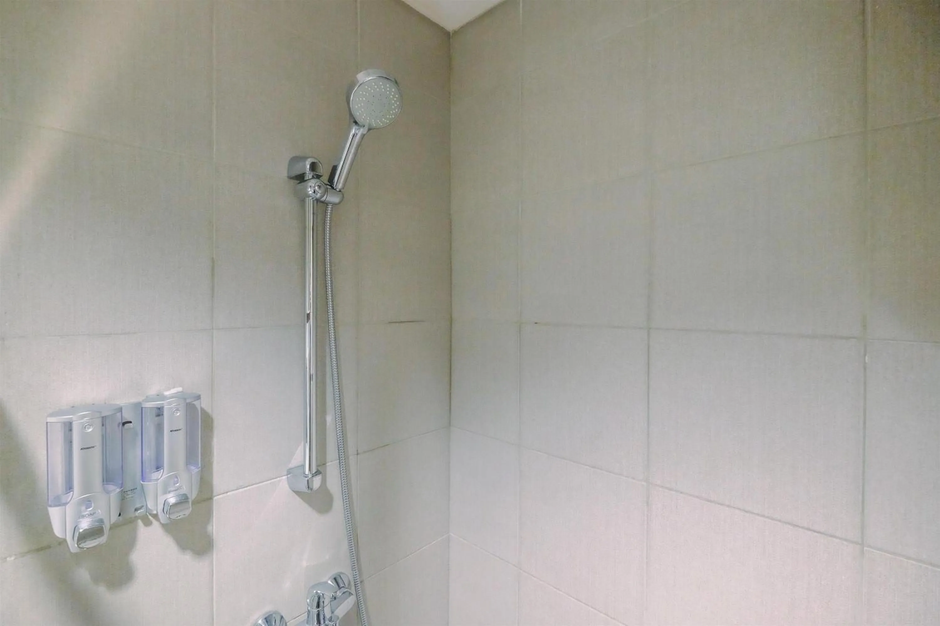 Bathroom in Stunning Studio Apartment at Bogor Icon By Travelio