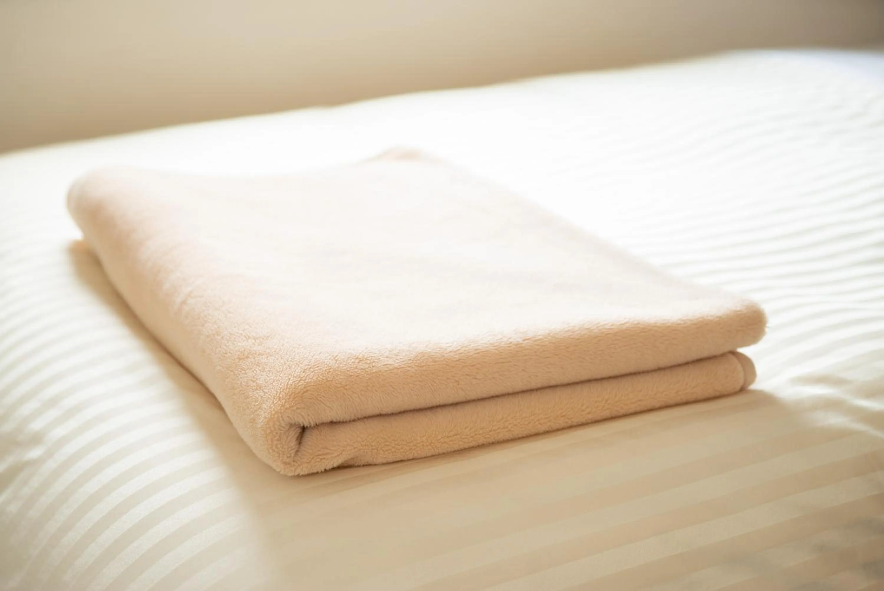 Bed in Super Hotel Yamagataeki Nishiguchi Hot Spring