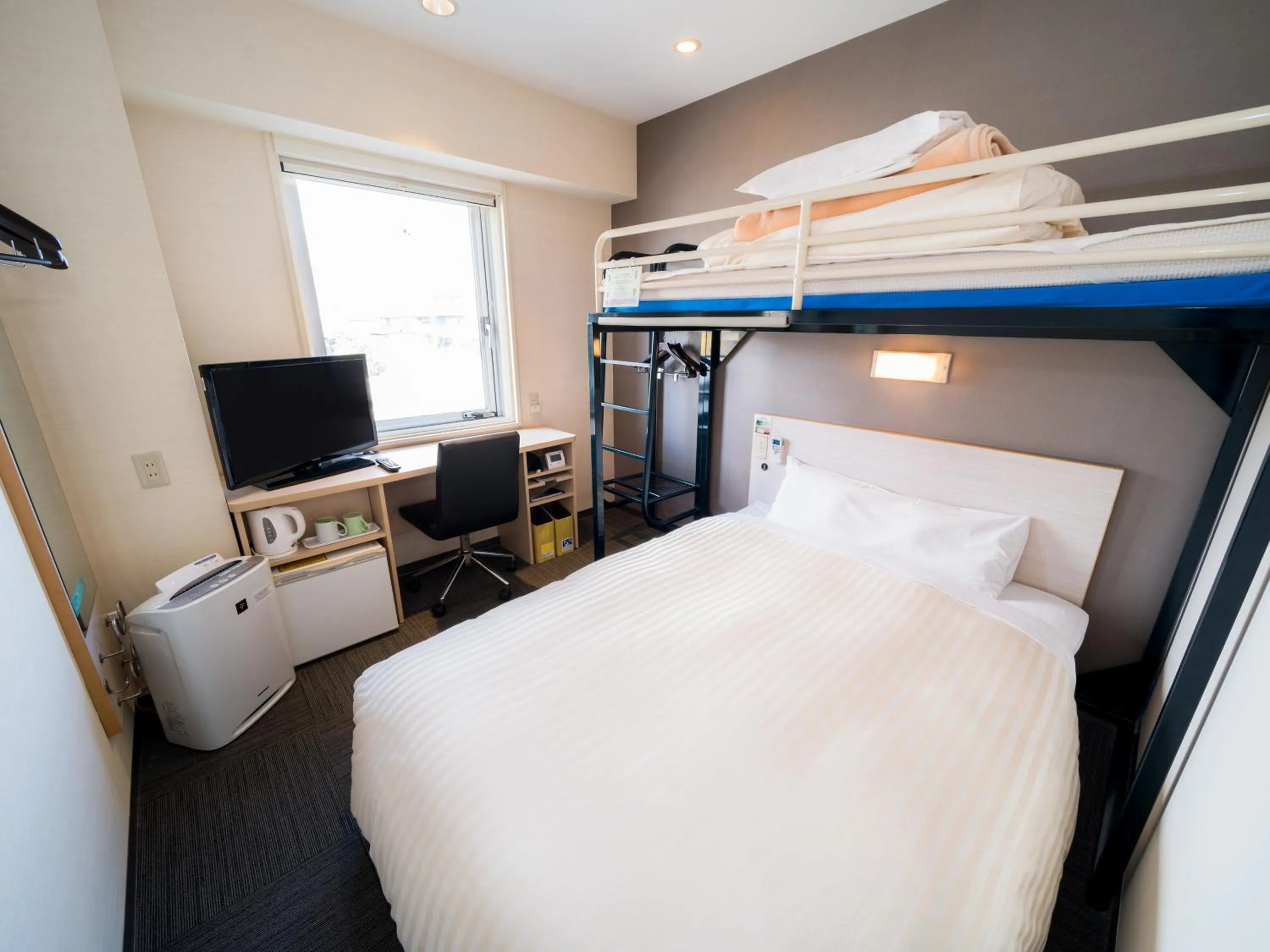 Bed in Super Hotel Yamagataeki Nishiguchi Hot Spring