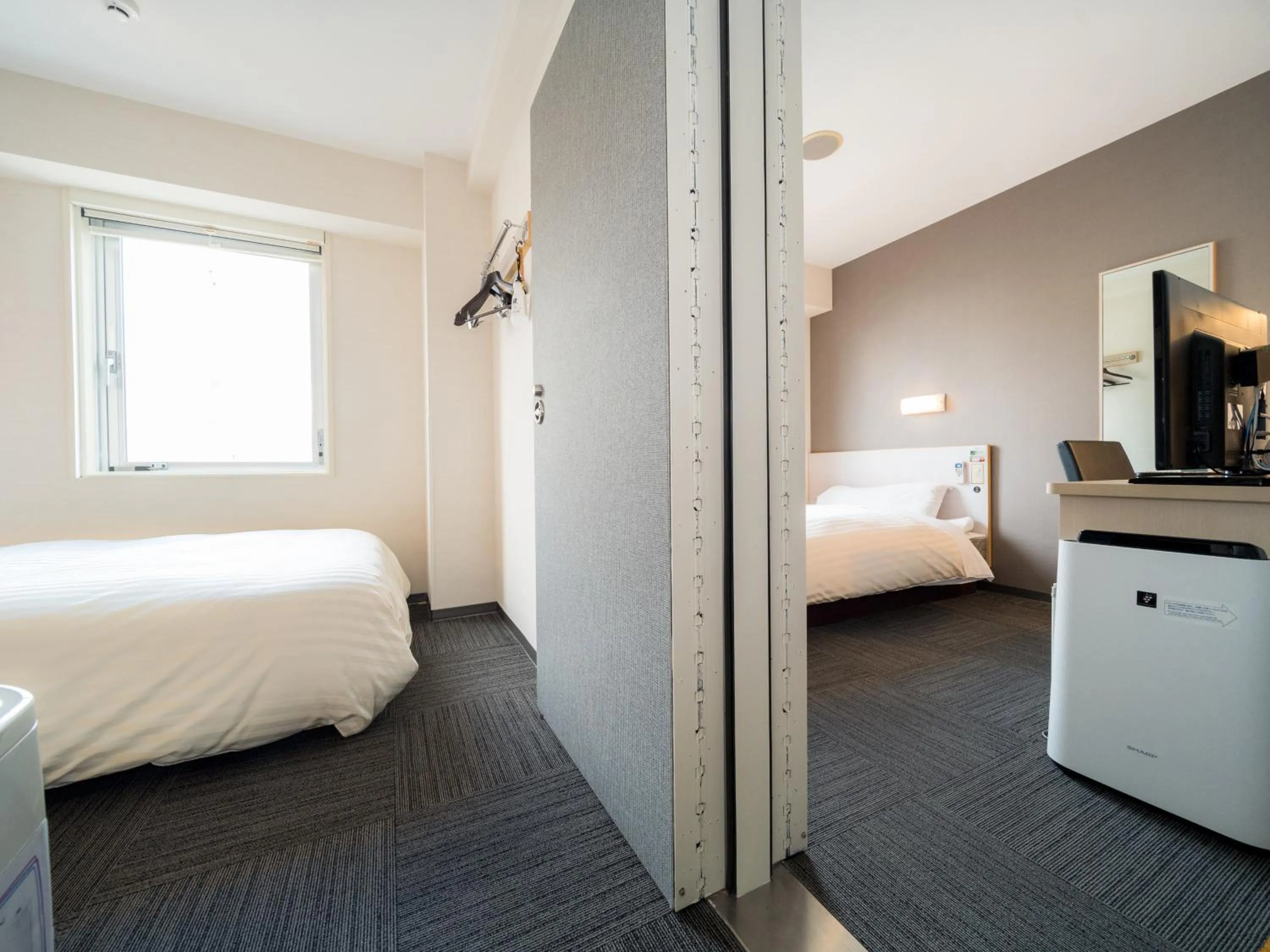 Bed in Super Hotel Yamagataeki Nishiguchi Hot Spring