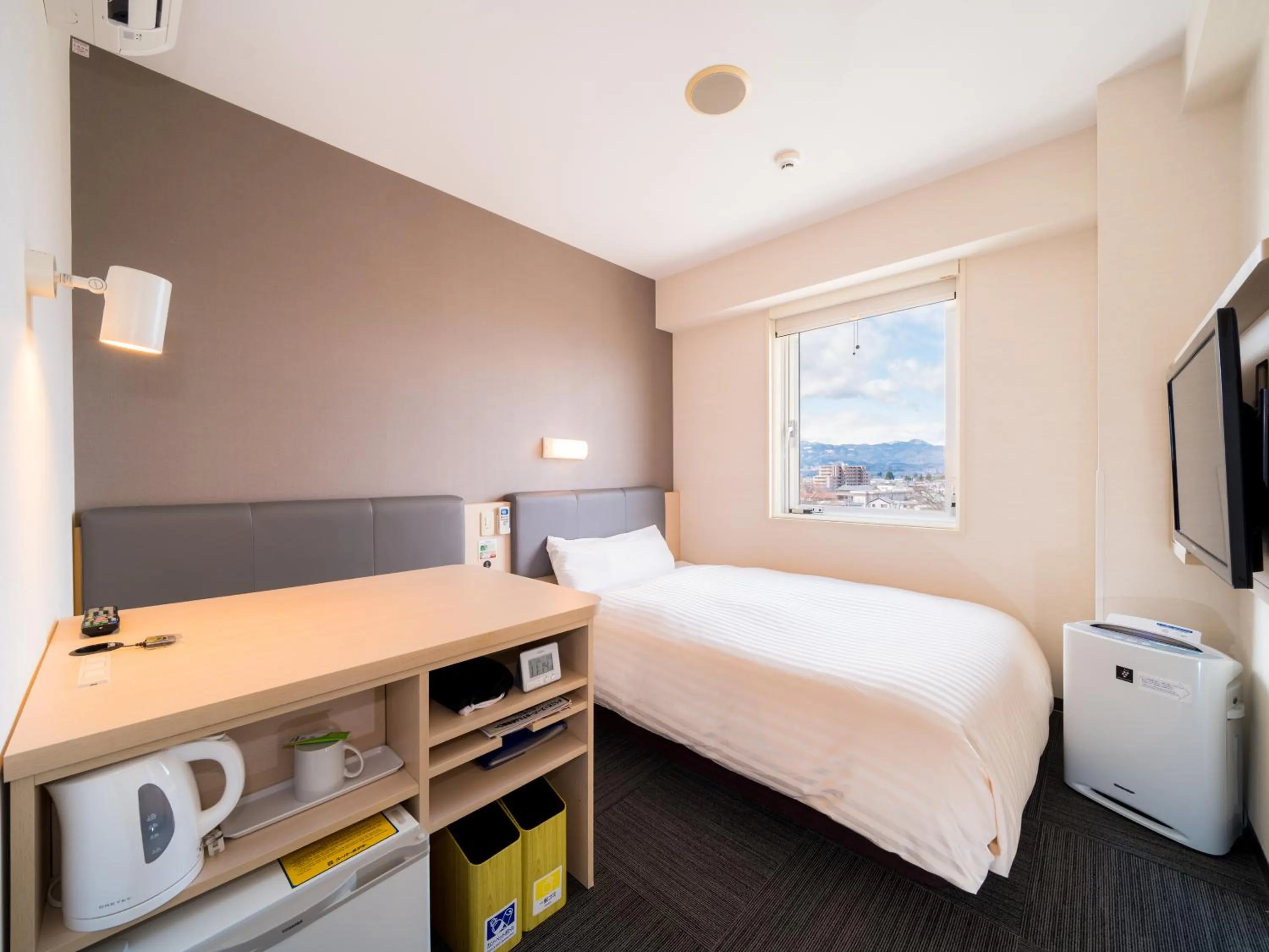 Bed in Super Hotel Yamagataeki Nishiguchi Hot Spring