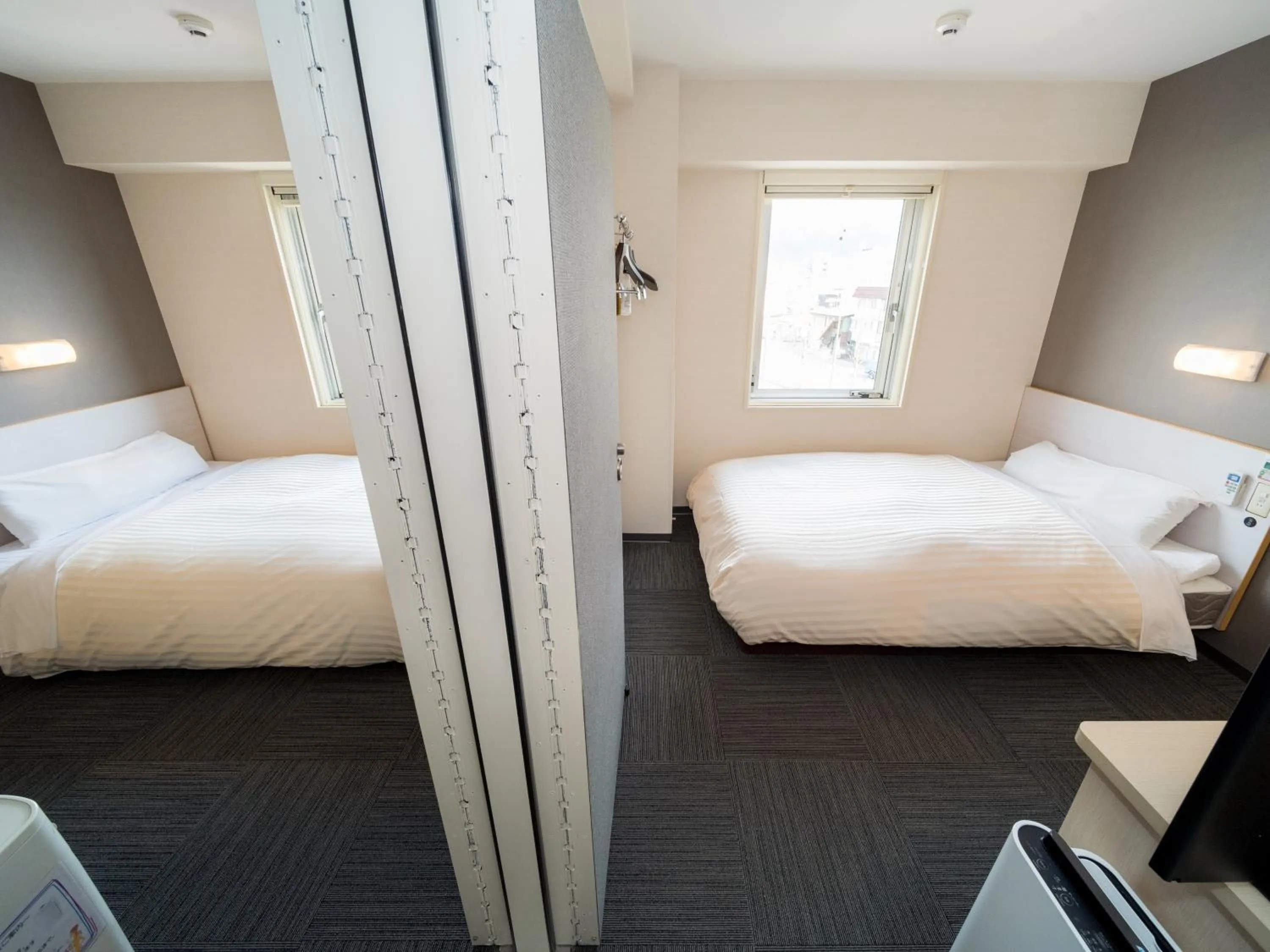 Bed in Super Hotel Yamagataeki Nishiguchi Hot Spring