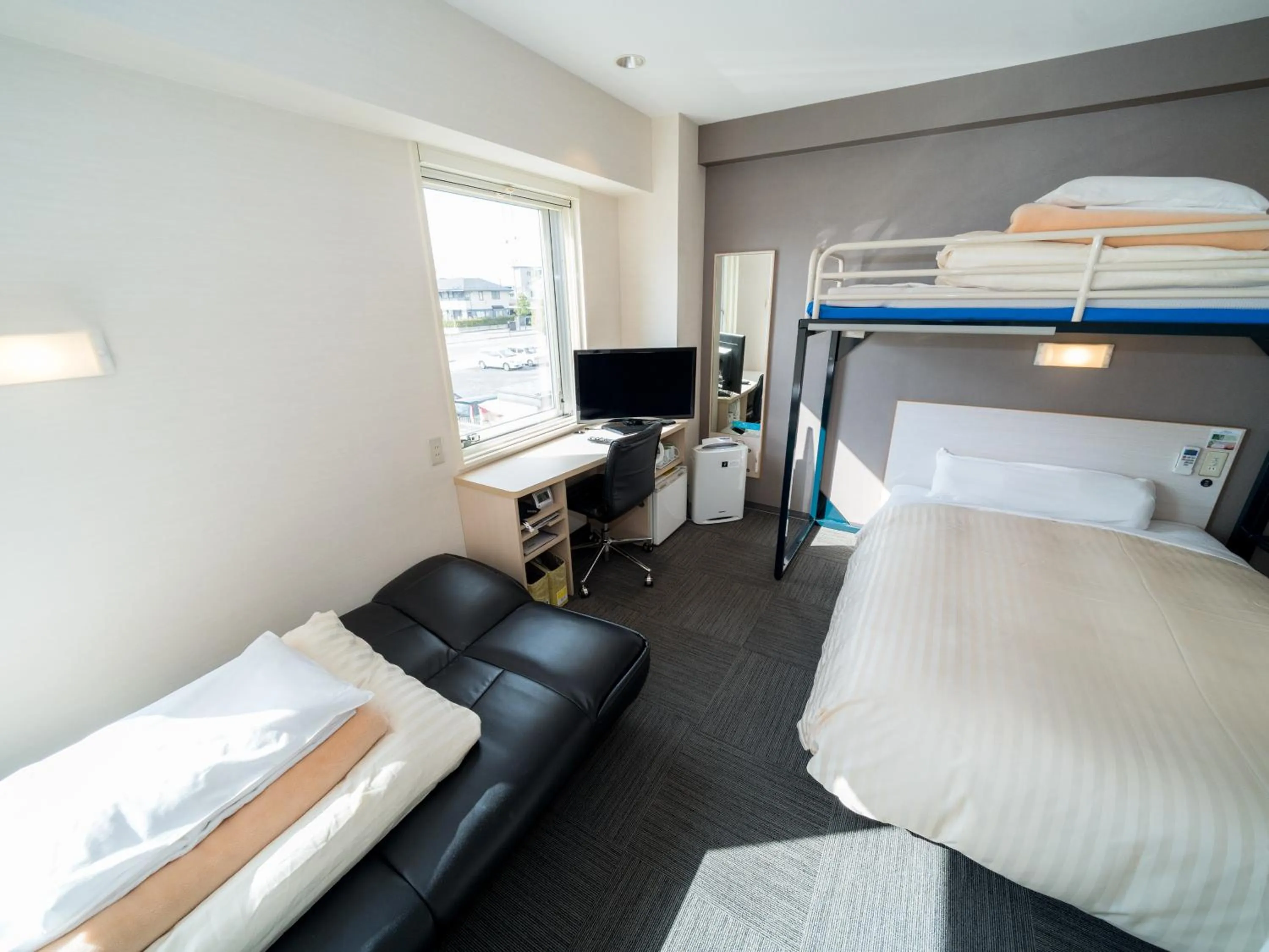 Bed in Super Hotel Yamagataeki Nishiguchi Hot Spring